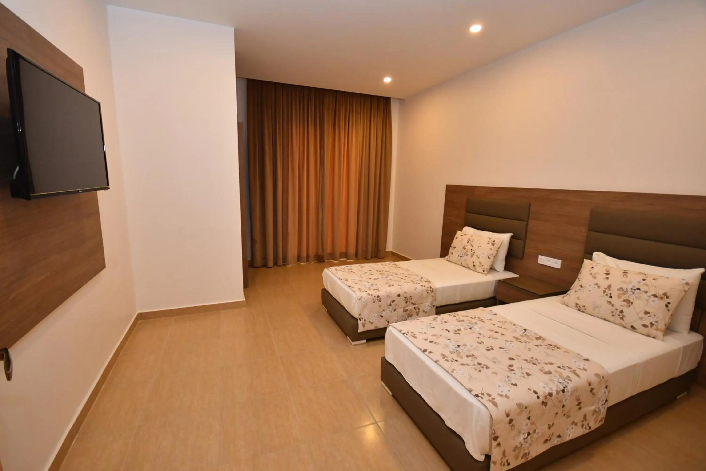 Bedroom in Appart Hôtel Ryadi