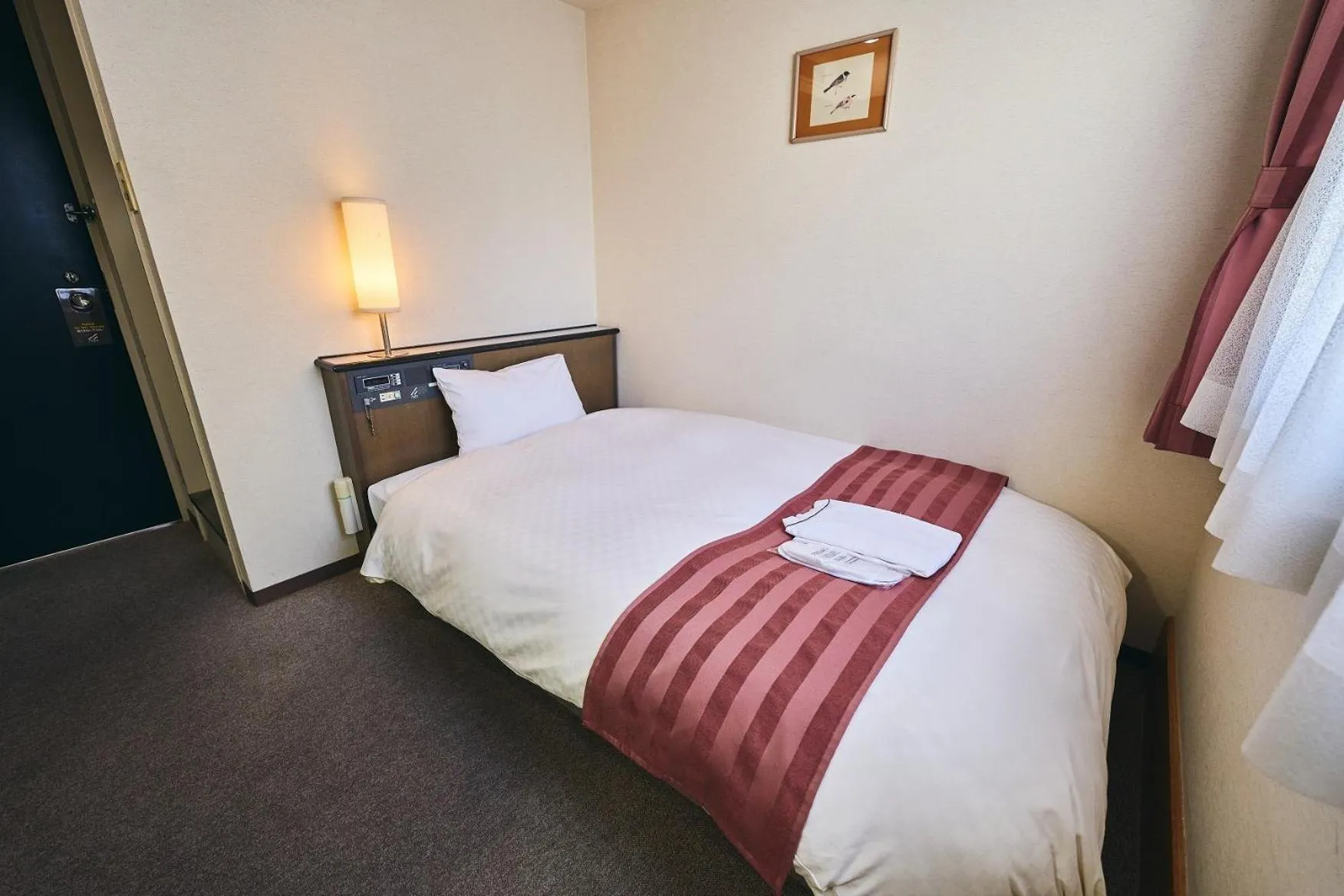 Bed in Hotel Astir Nagoya Sakae