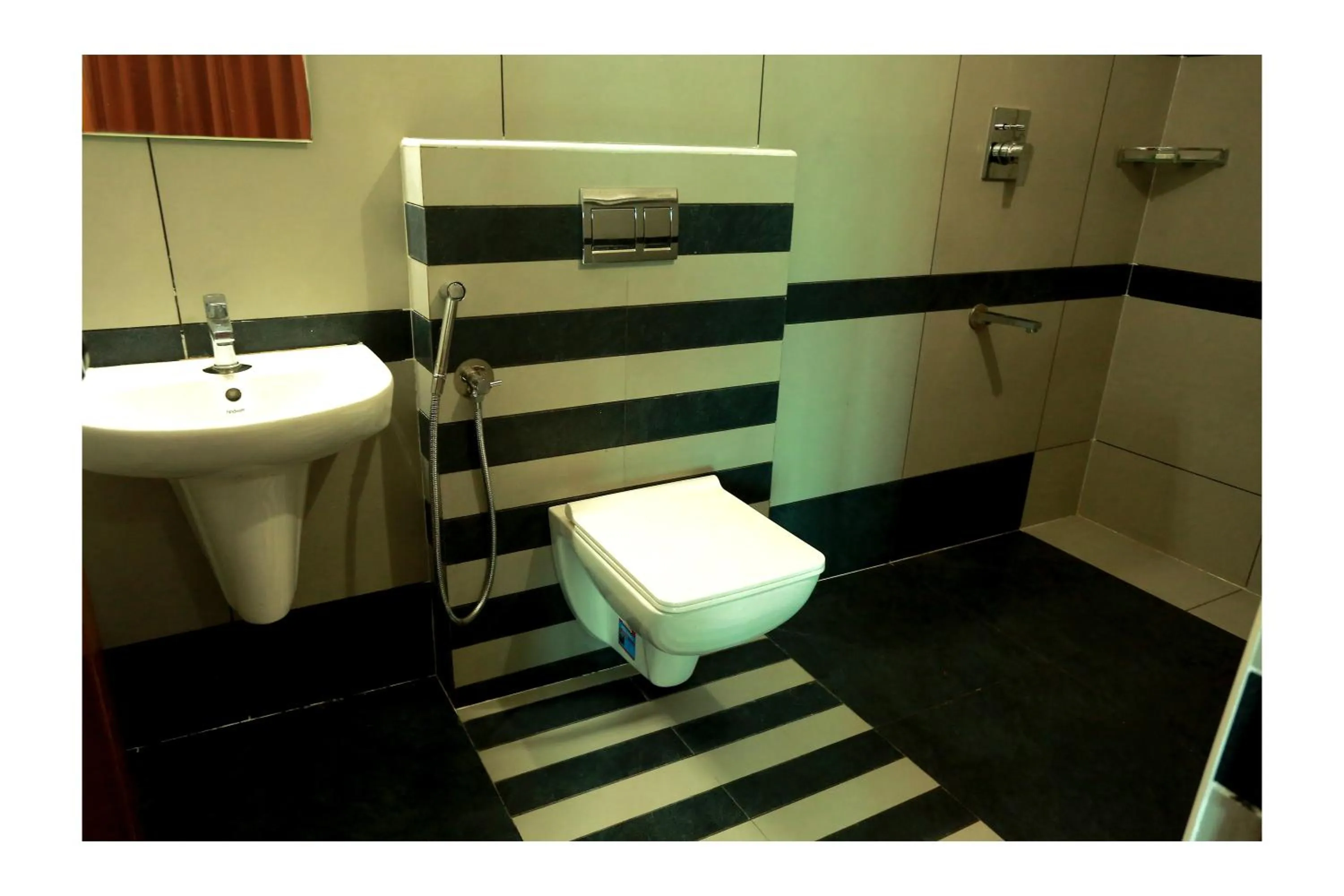 Toilet in CORRIDOR CALICUT Airport Hotel