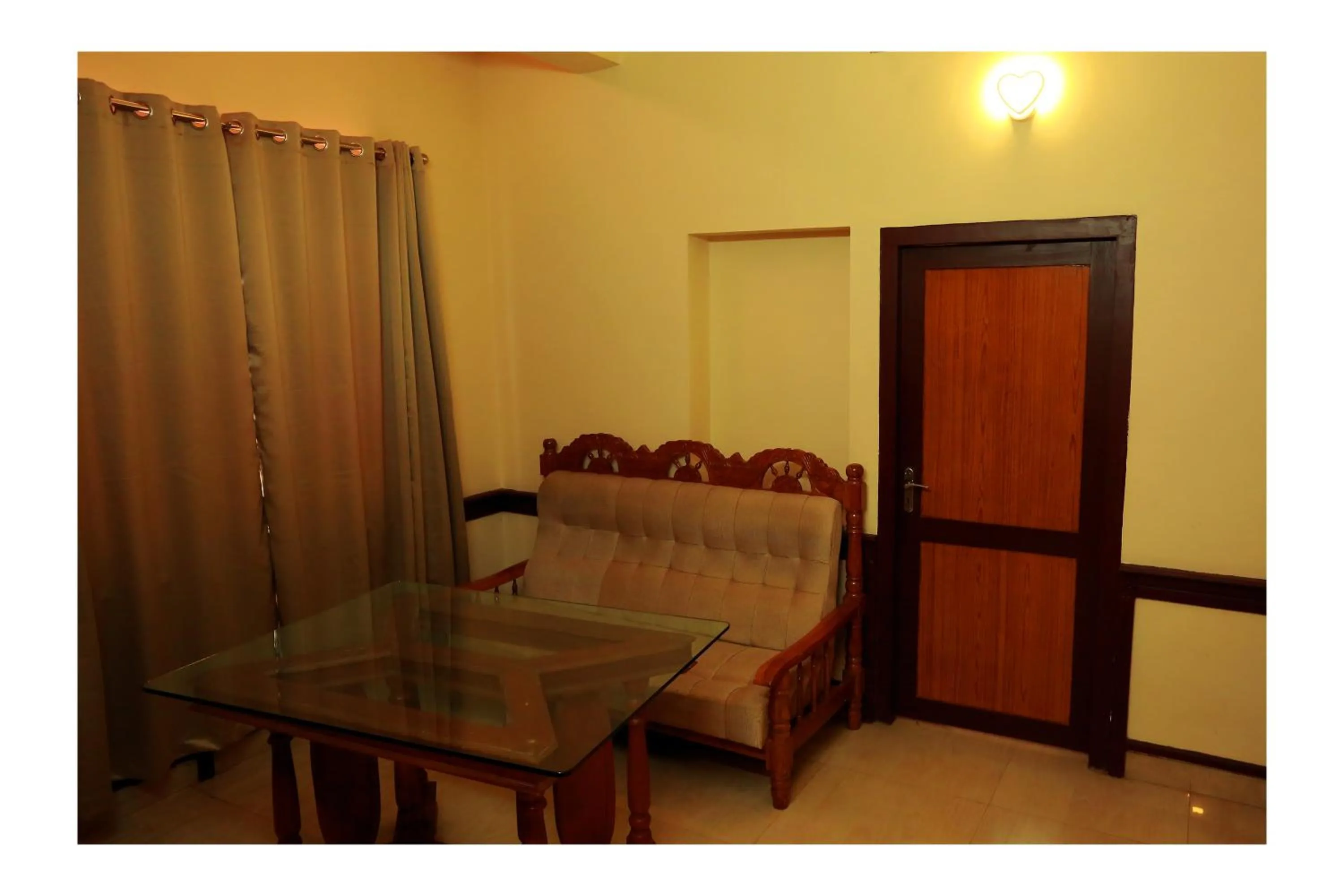 Living room in CORRIDOR CALICUT Airport Hotel