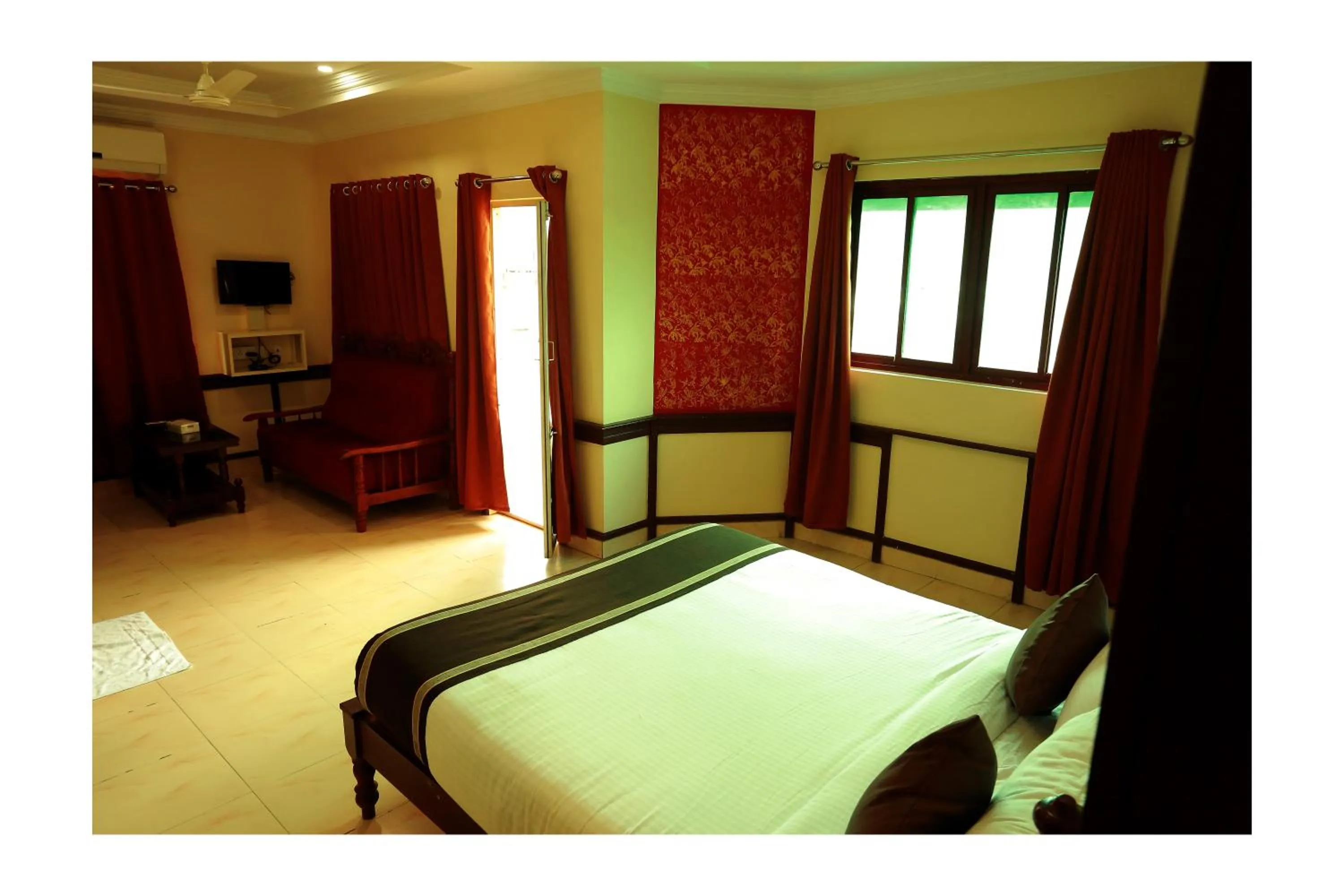 Bed in CORRIDOR CALICUT Airport Hotel