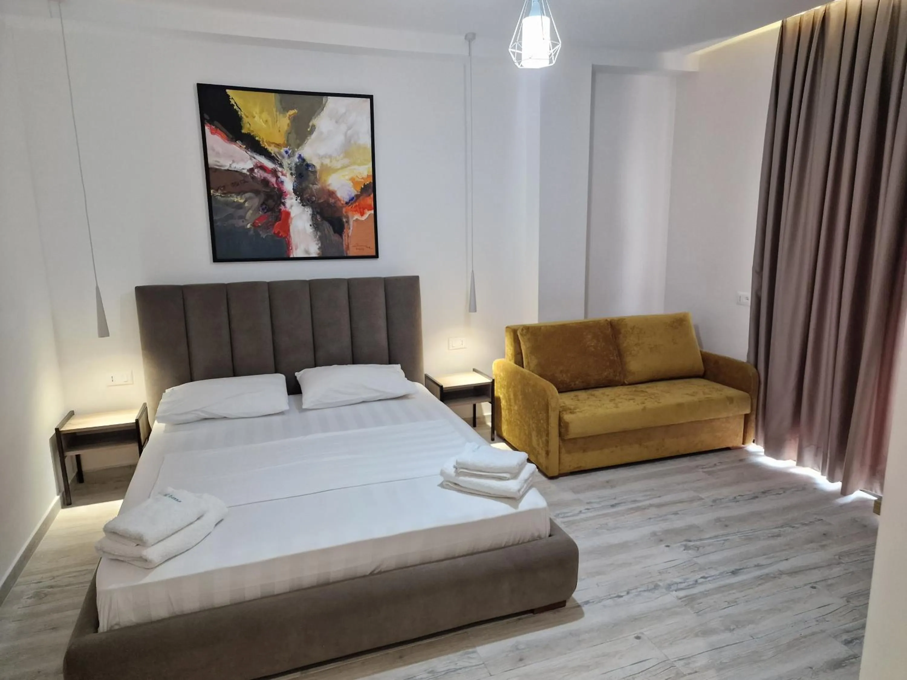 Photo of the whole room, Bed in Joanna Suites