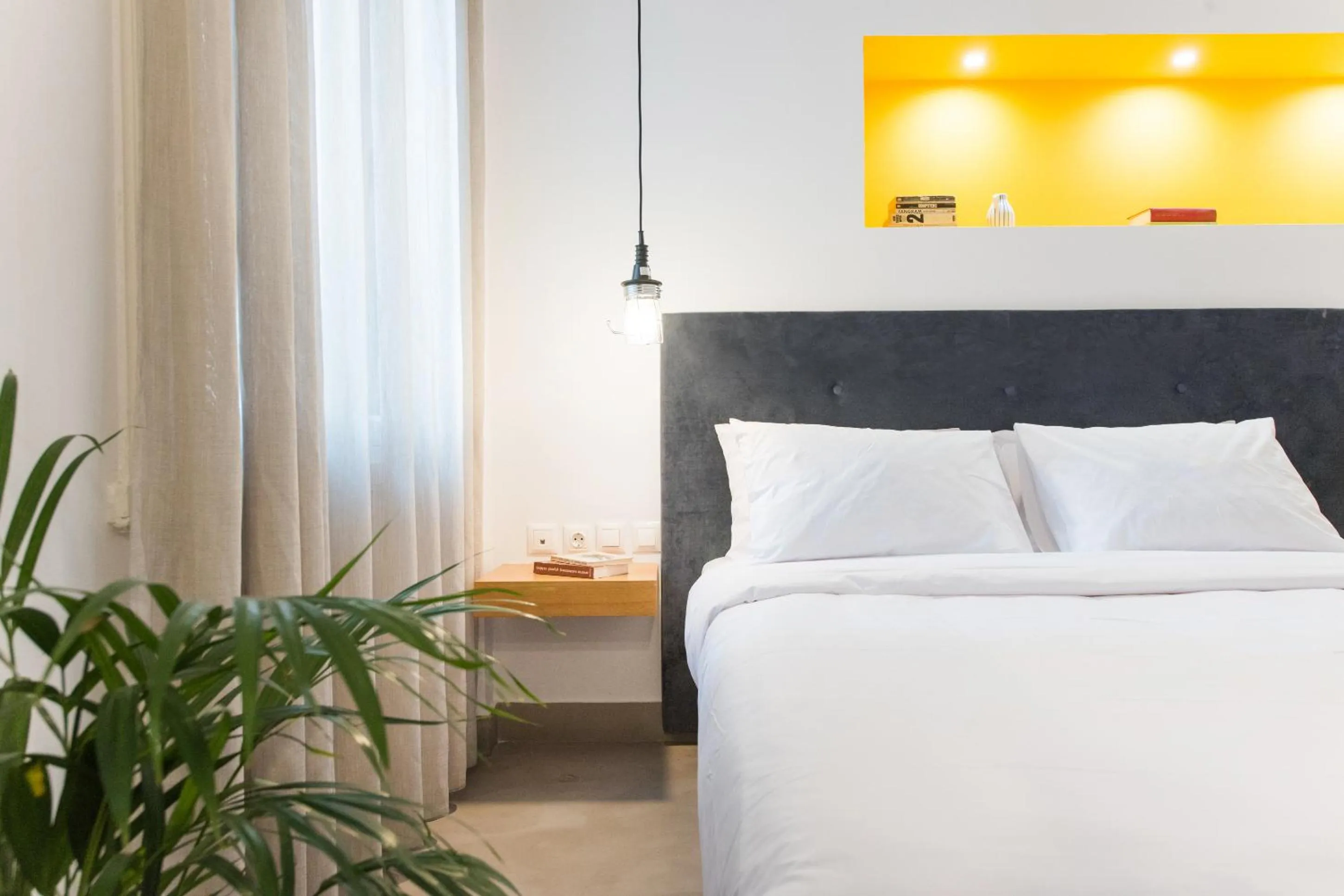 Bed in MONK Monastiraki Suites