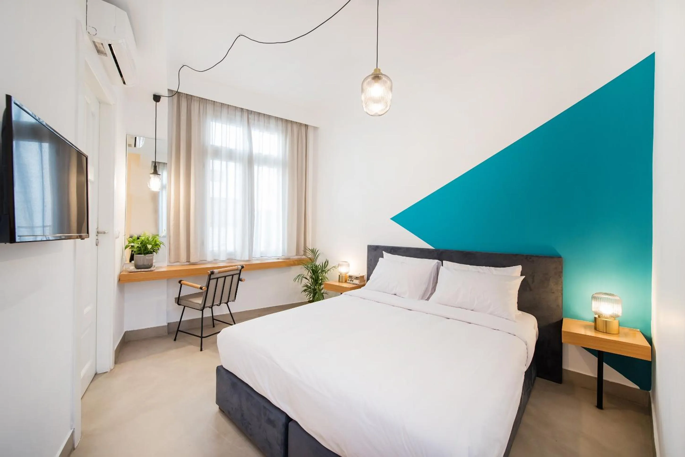 Bed in MONK Monastiraki Suites