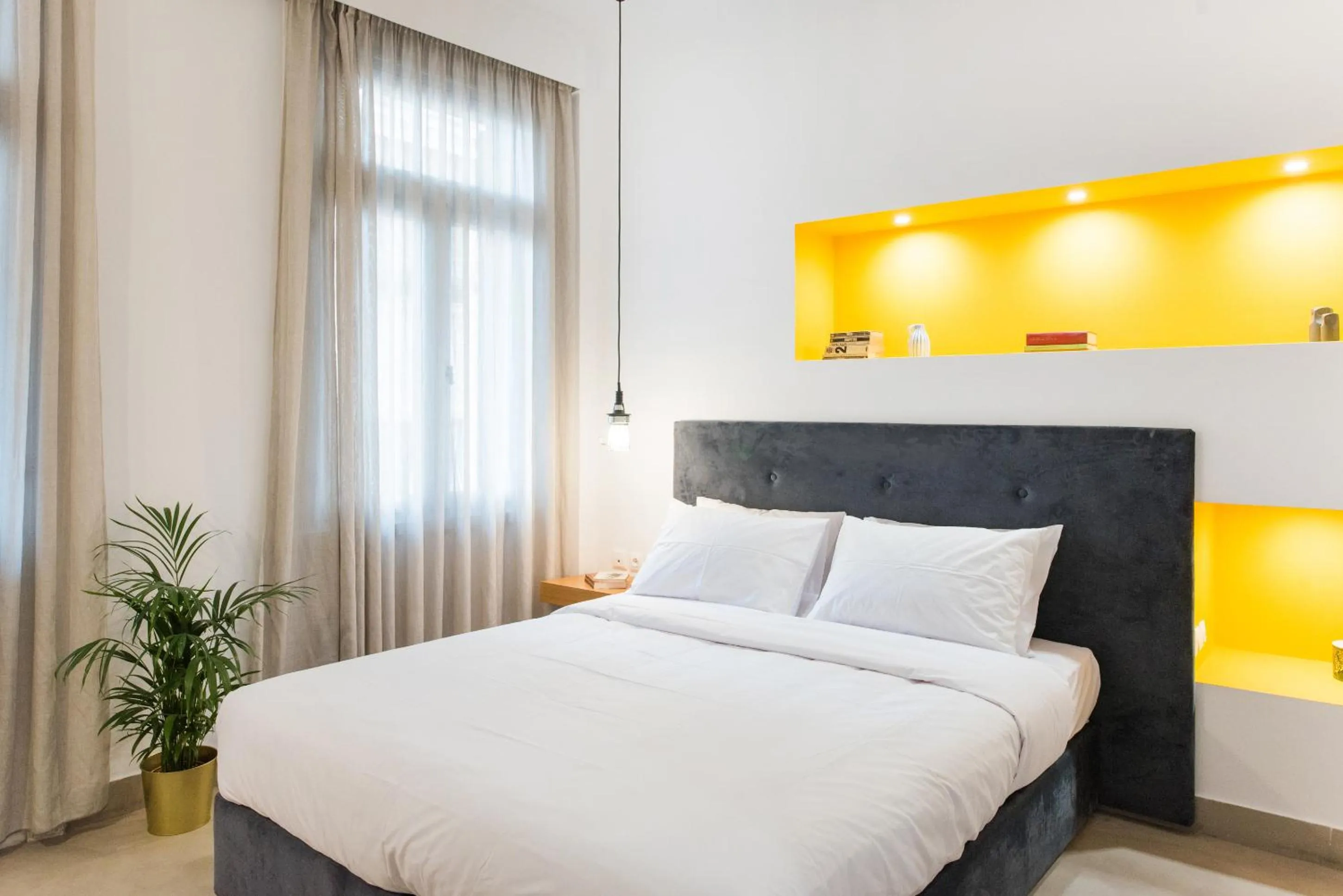 Bed in MONK Monastiraki Suites