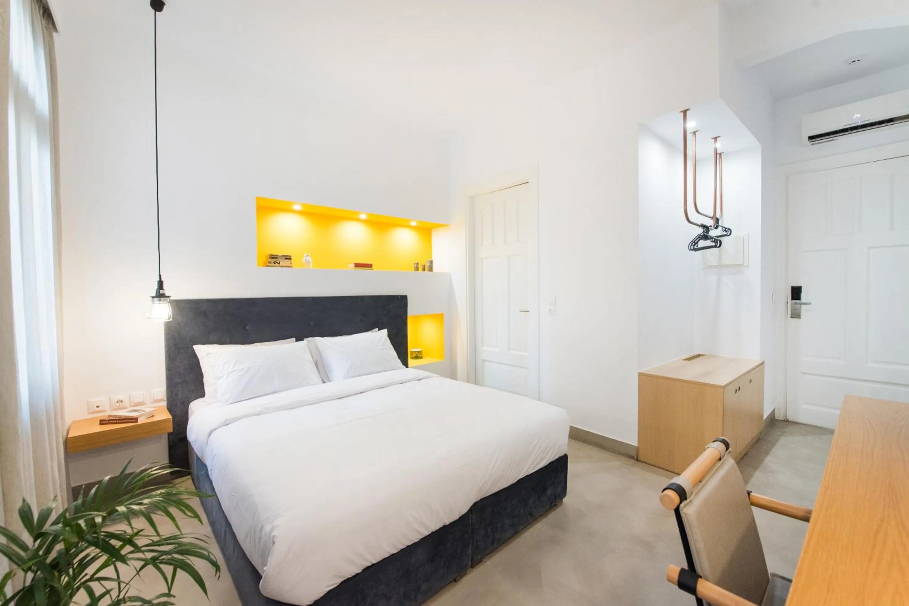 Bed in MONK Monastiraki Suites