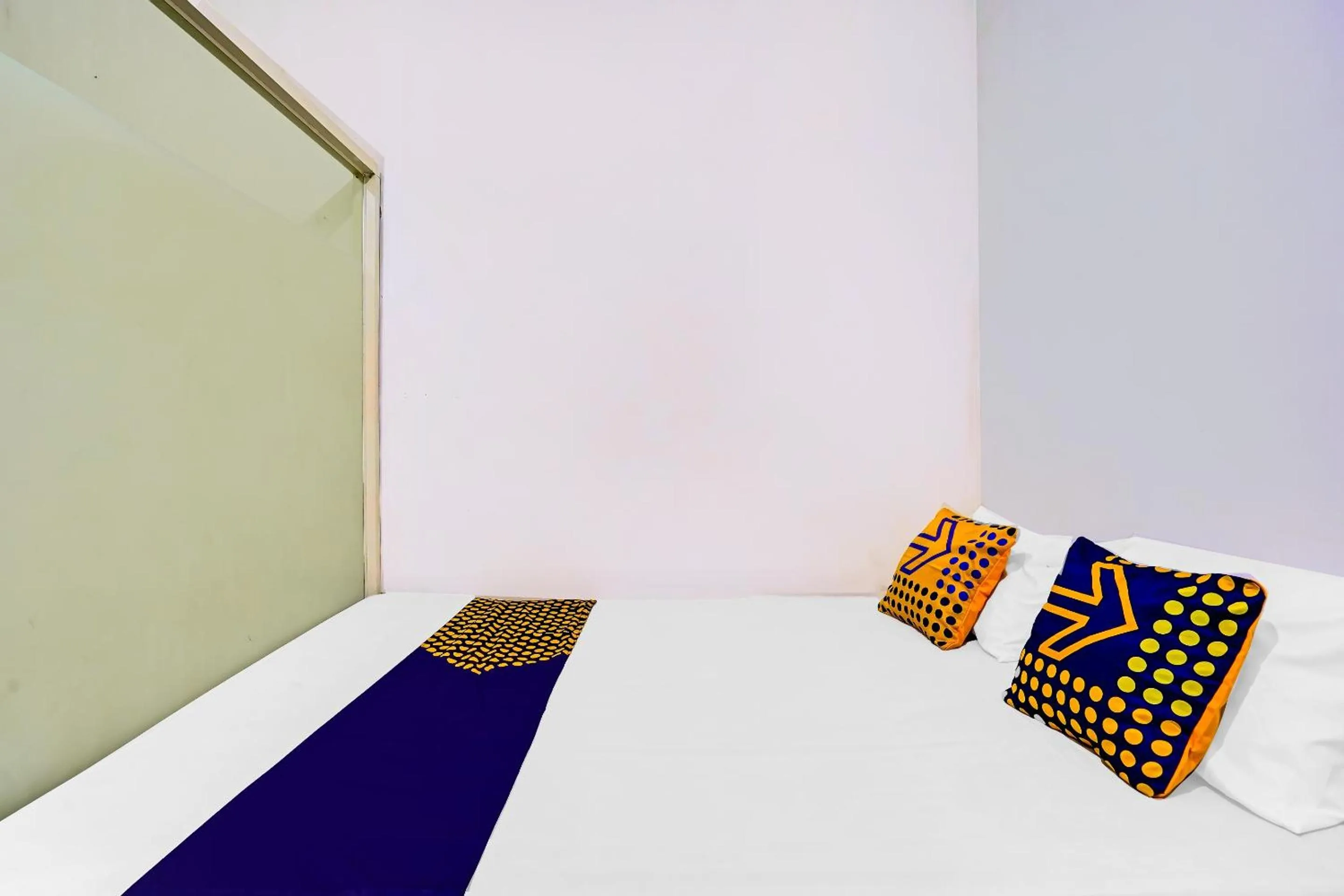 Bedroom in SPOT ON 90586 Hagawa Syariah Homestay