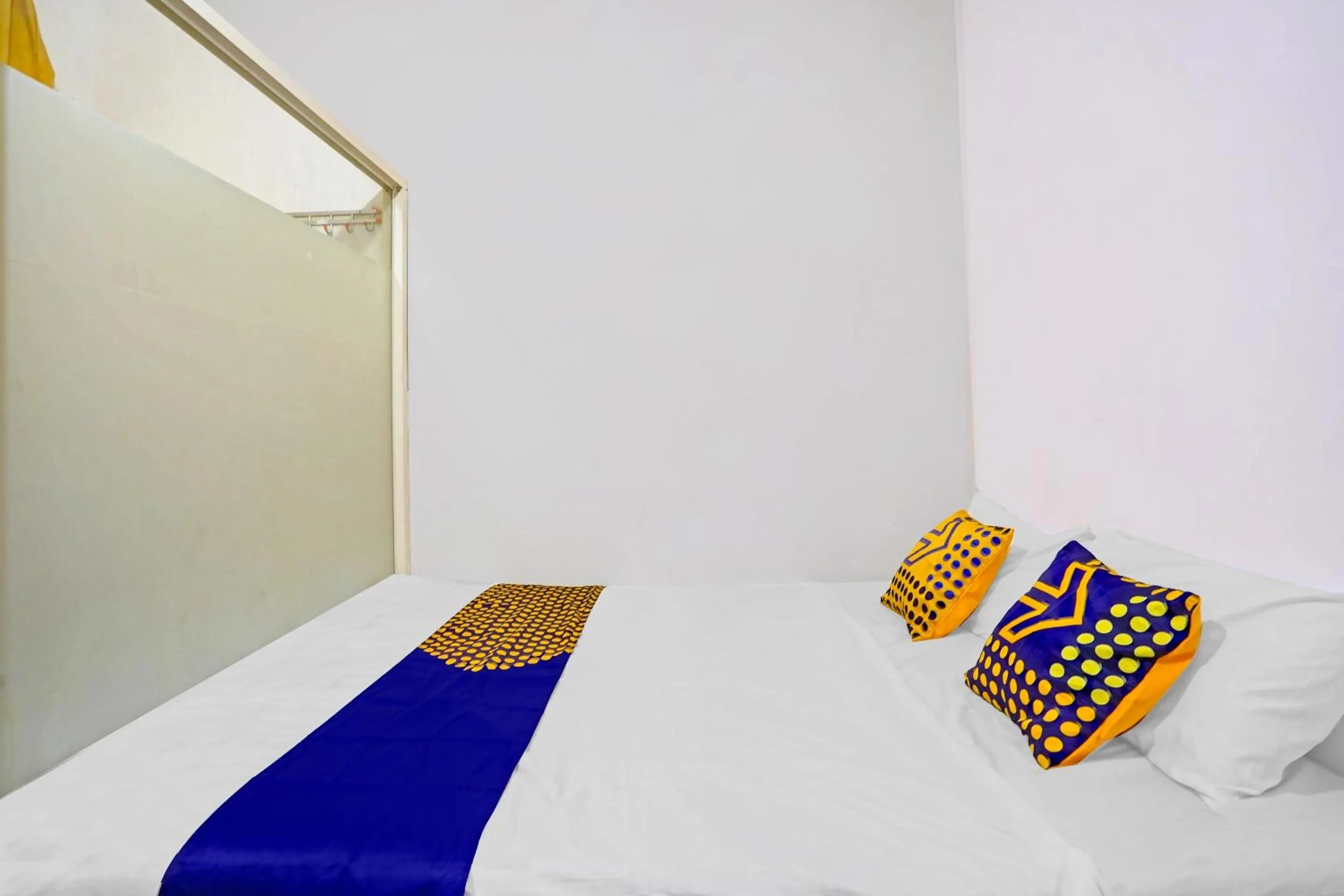 Bedroom in SPOT ON 90586 Hagawa Syariah Homestay