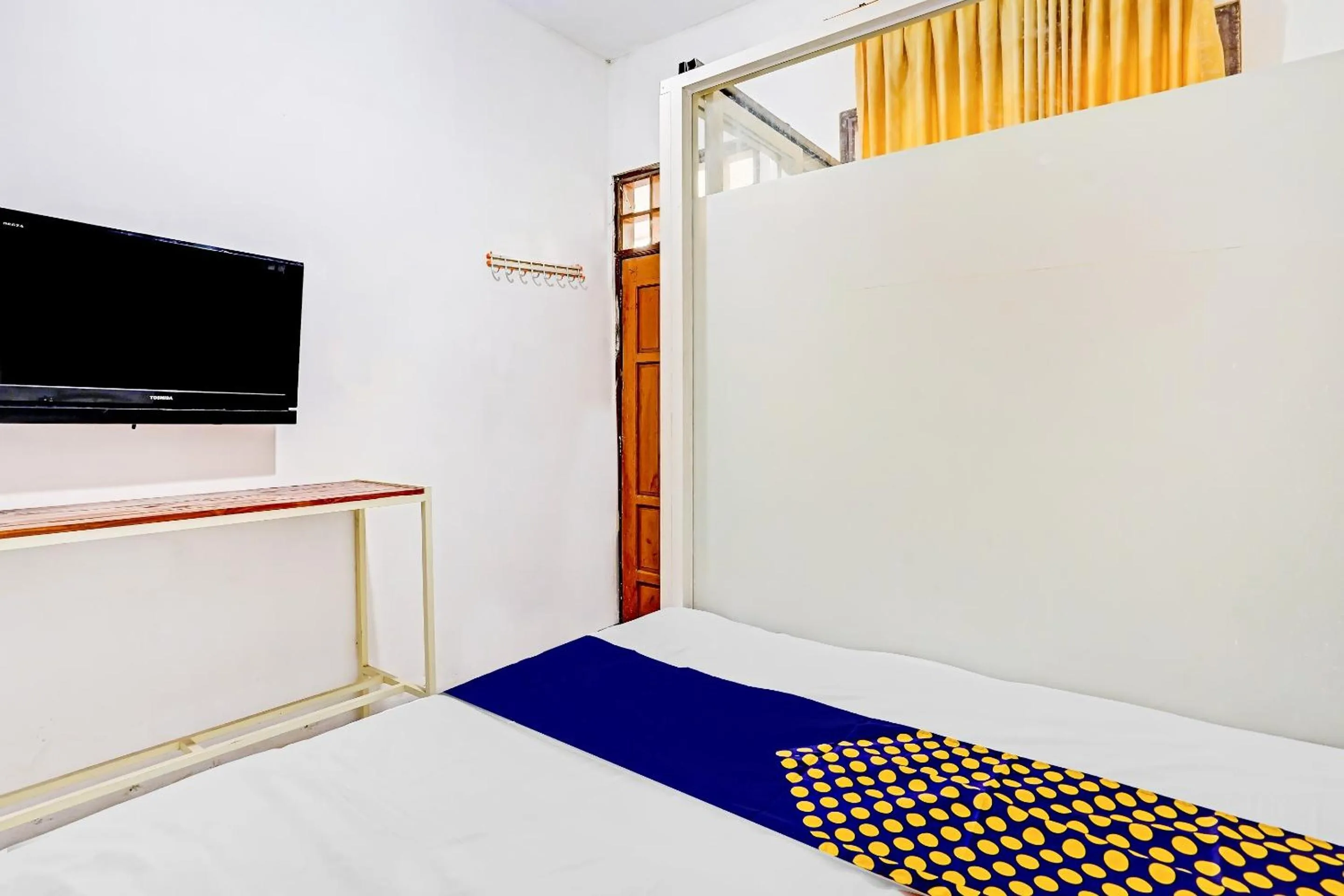 Bedroom in SPOT ON 90586 Hagawa Syariah Homestay