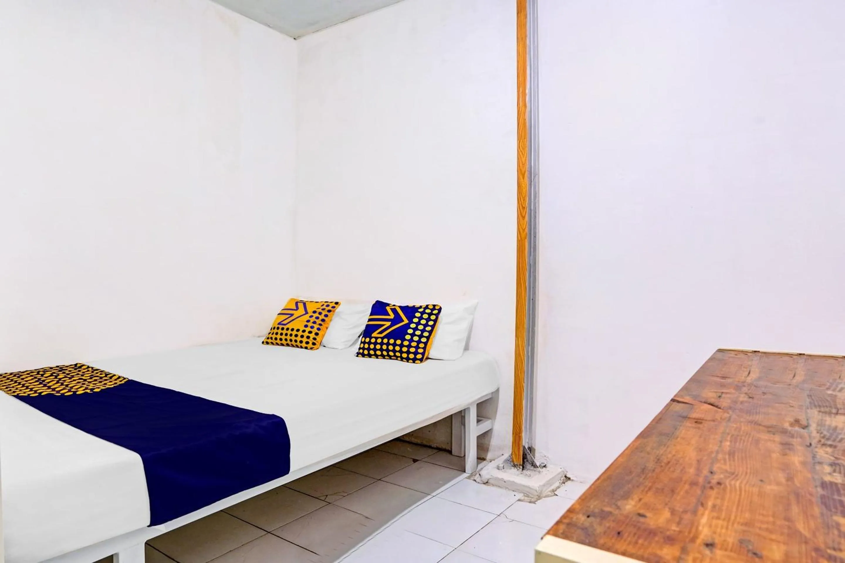 Bedroom in SPOT ON 90586 Hagawa Syariah Homestay