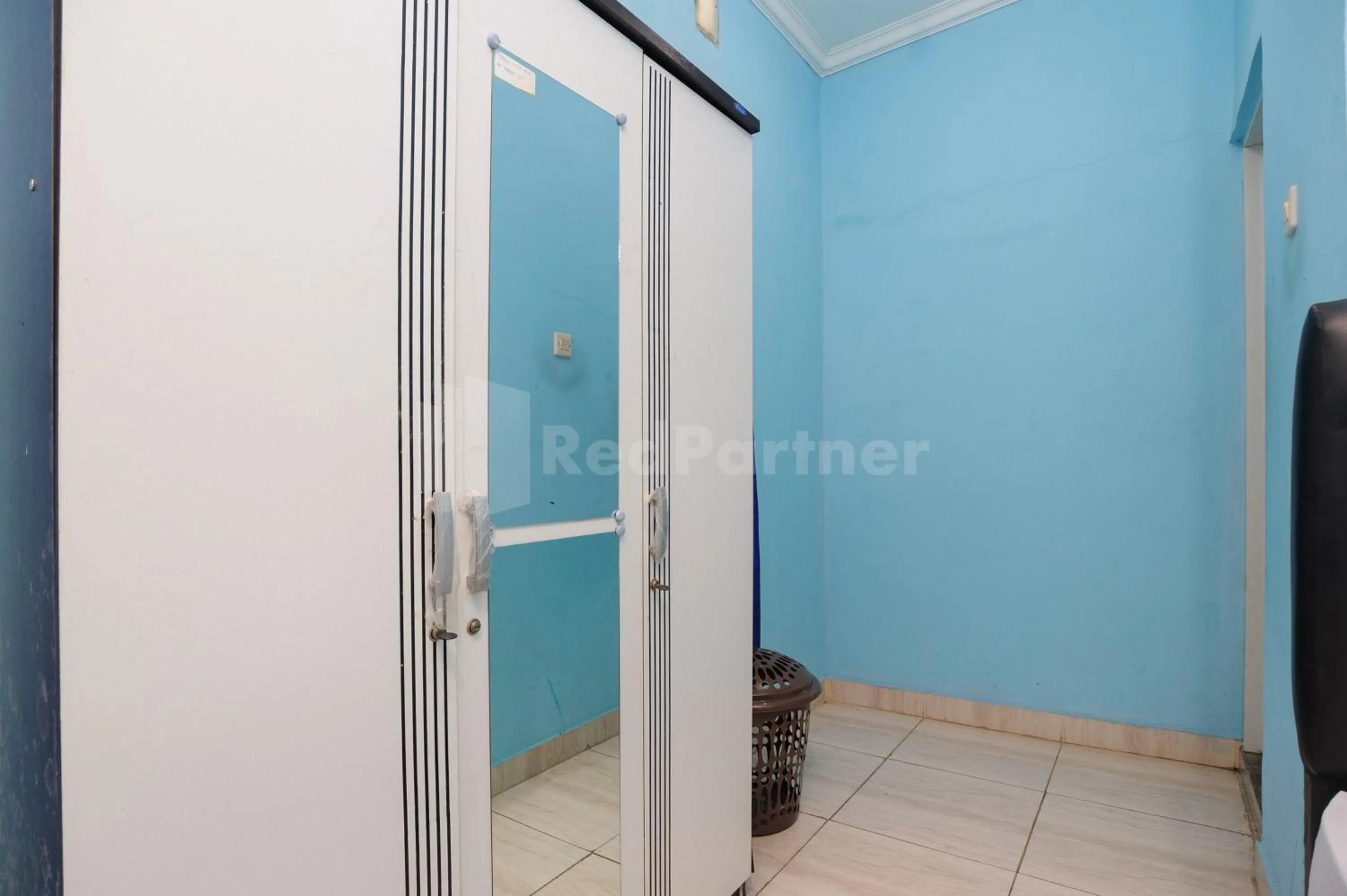 Bedroom in OYO 90594 Fajar Inn