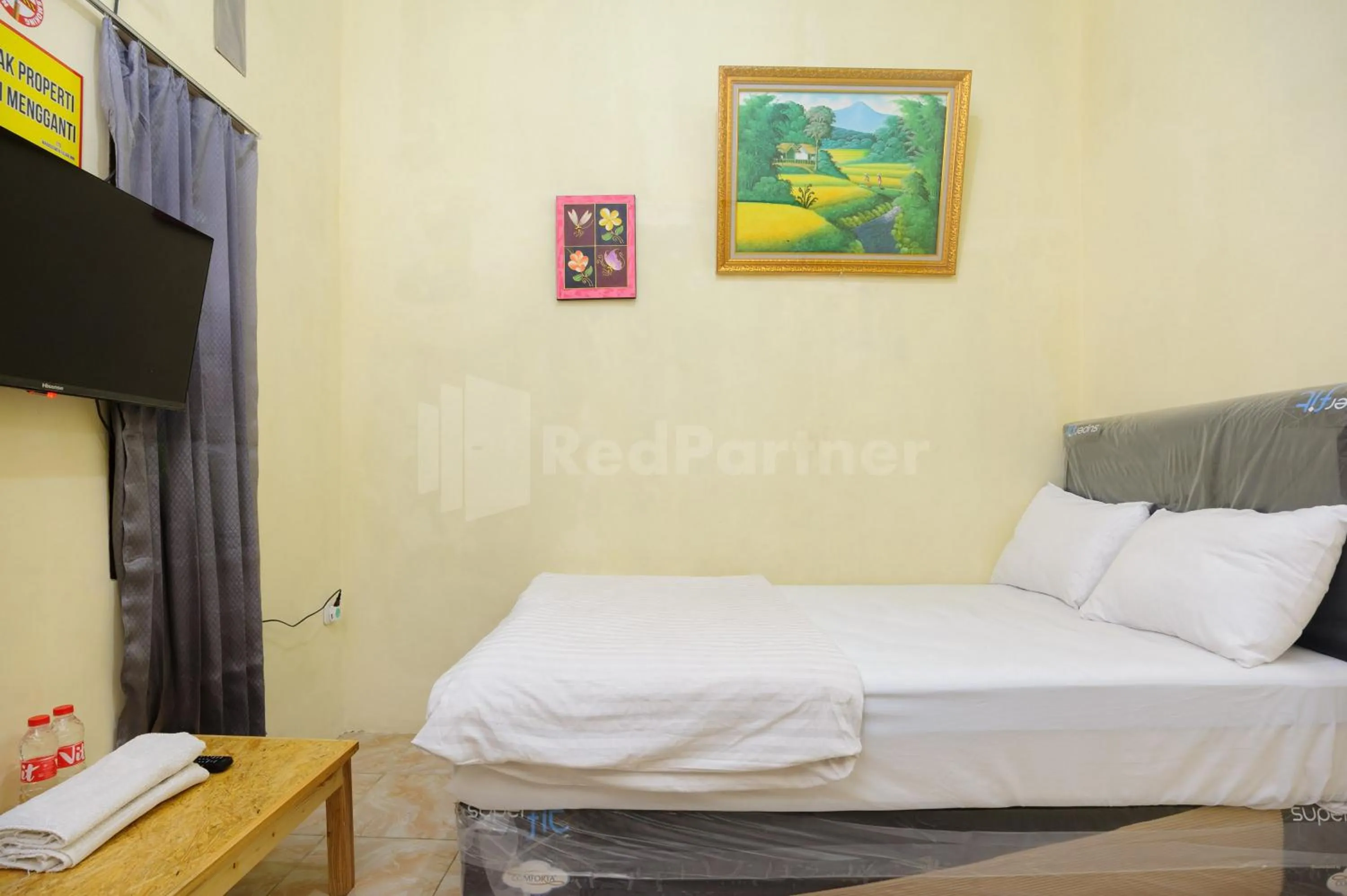 Bed in OYO 90594 Fajar Inn