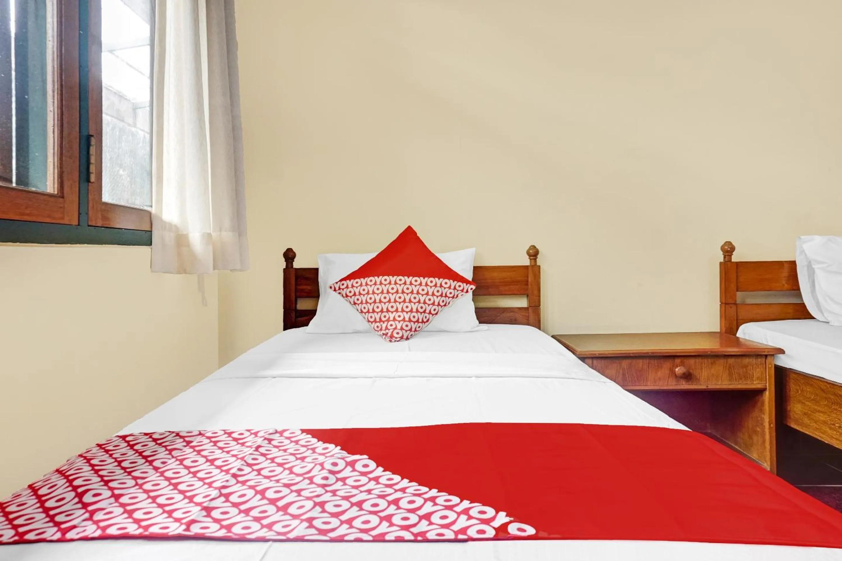 Bed in Hotel O 90596 Hotel Griya Astoeti