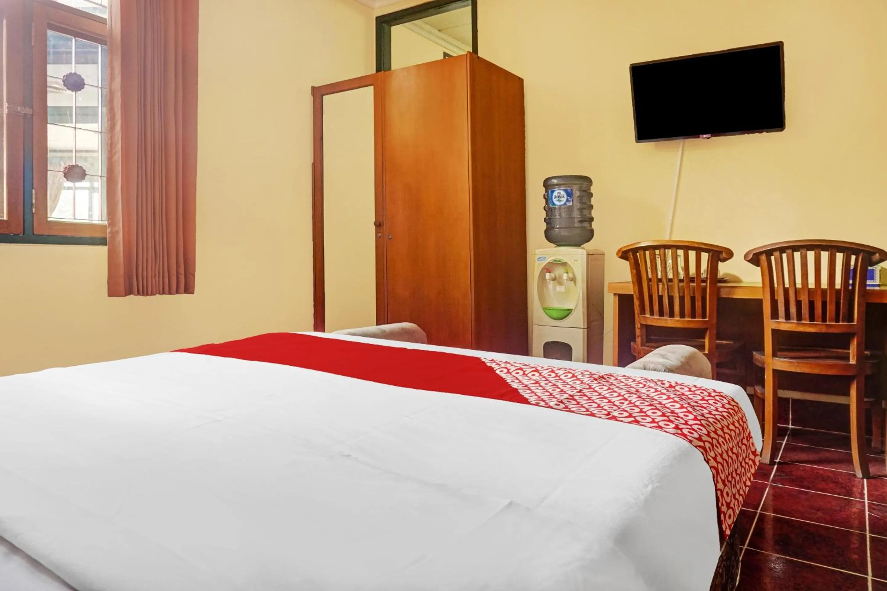 Bed in Hotel O 90596 Hotel Griya Astoeti