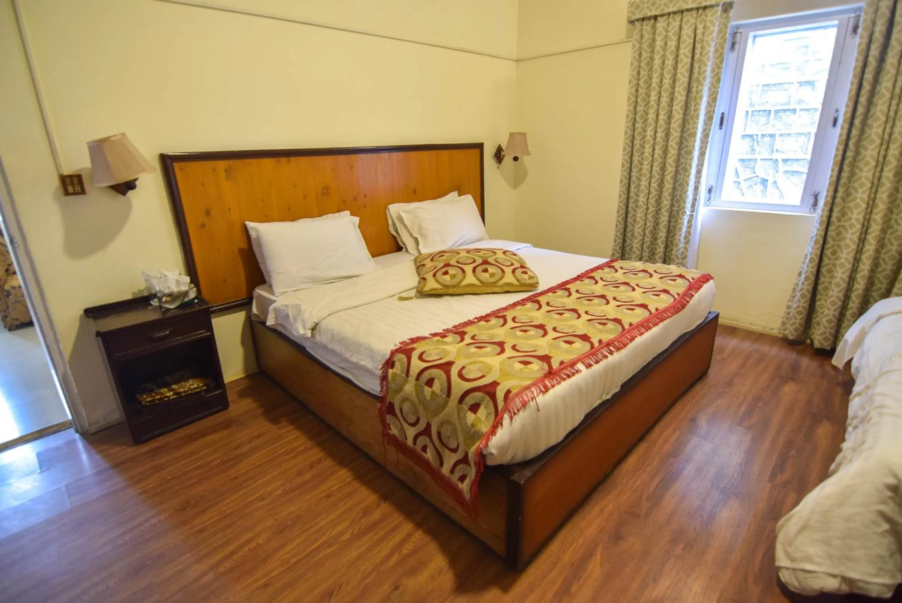 Bedroom in Parhena Cottages Bella Naran