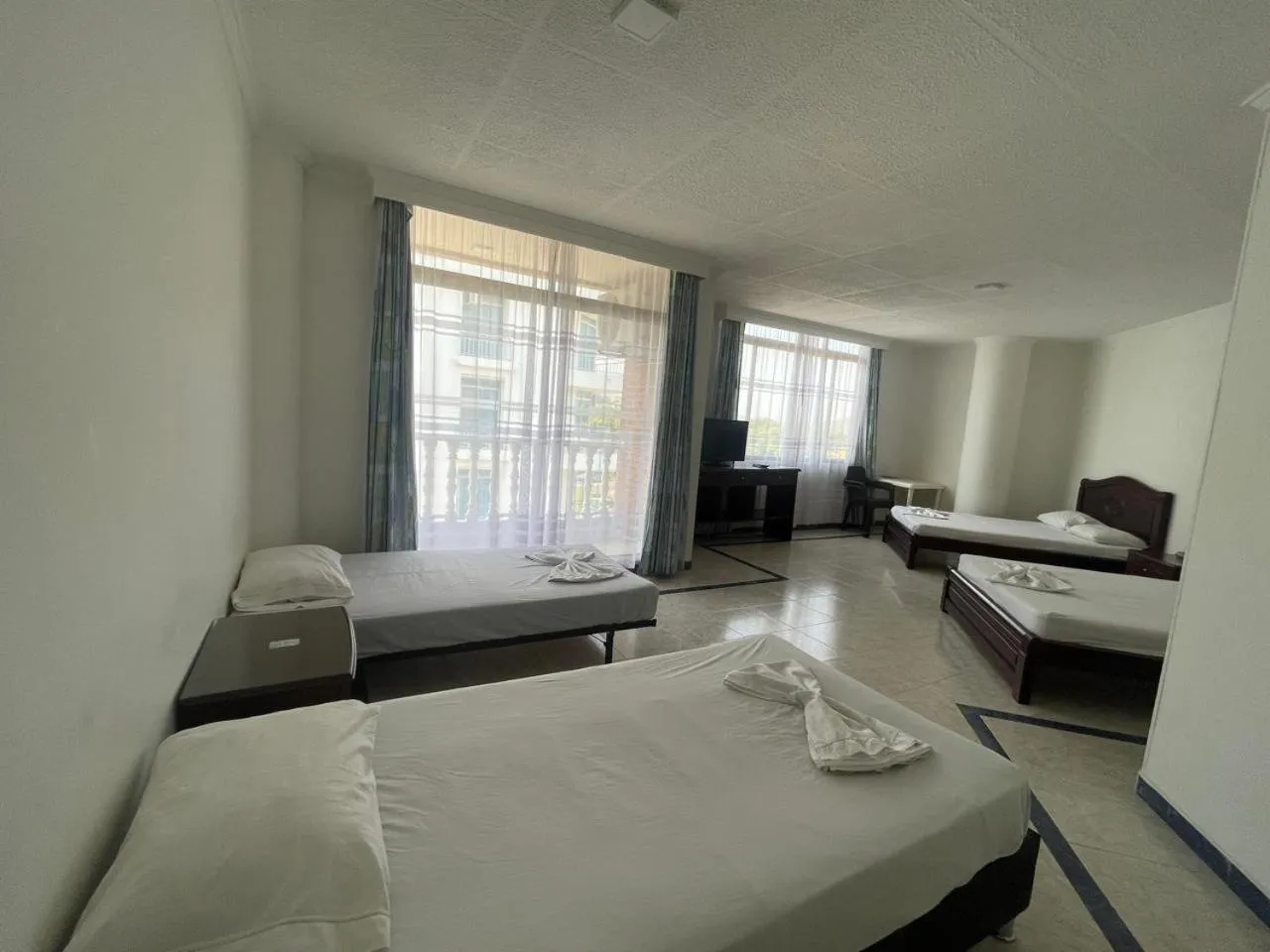 Property building, Bed in Zahira Hotel Melgar