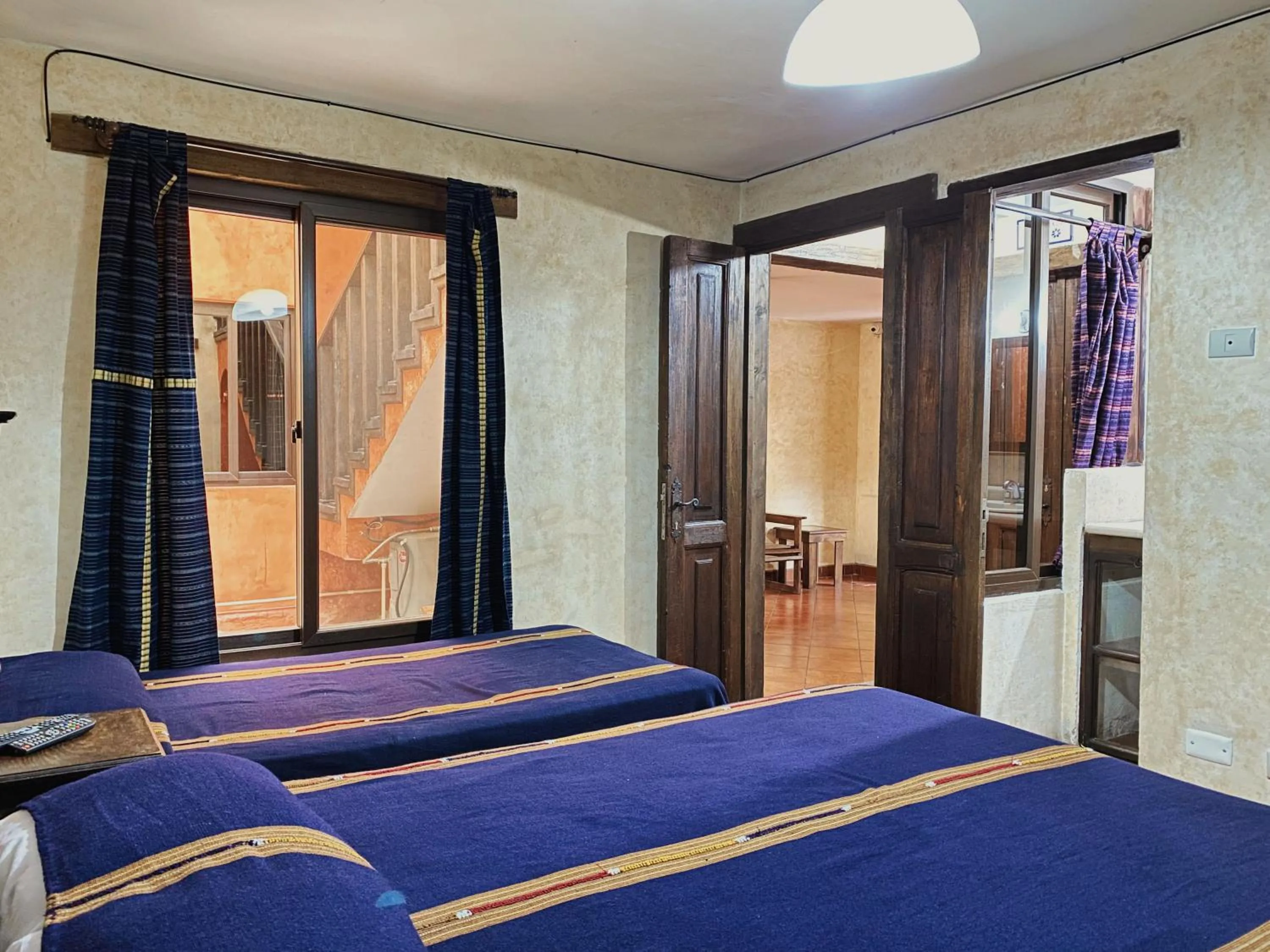 Bed in Hotel Maya Ik'