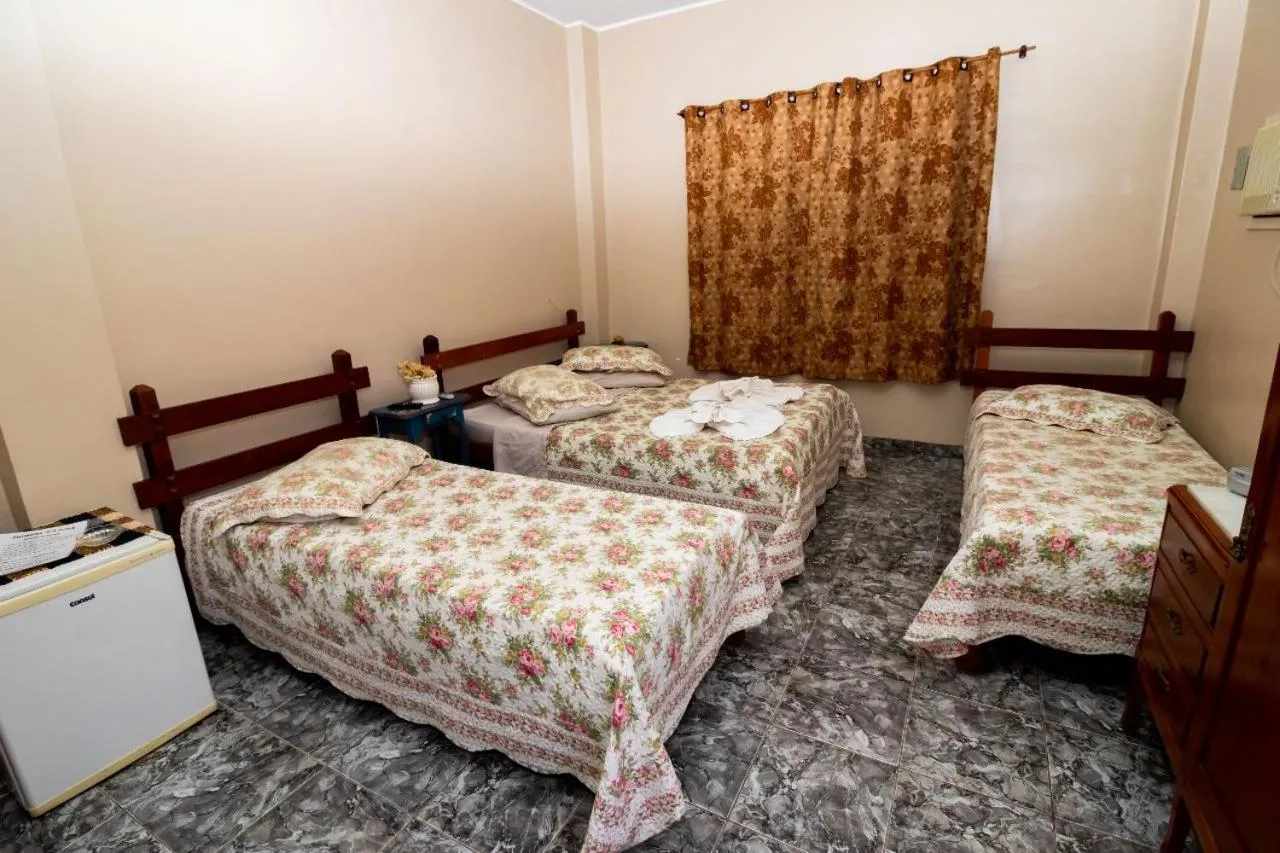 Bed in Pousada Oca Porã