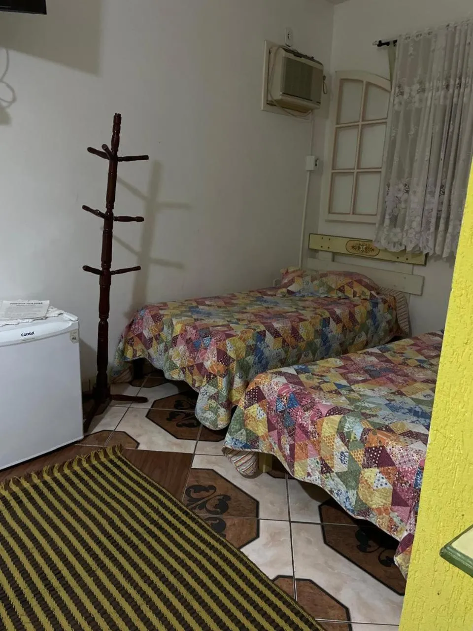 Bed in Pousada Oca Porã