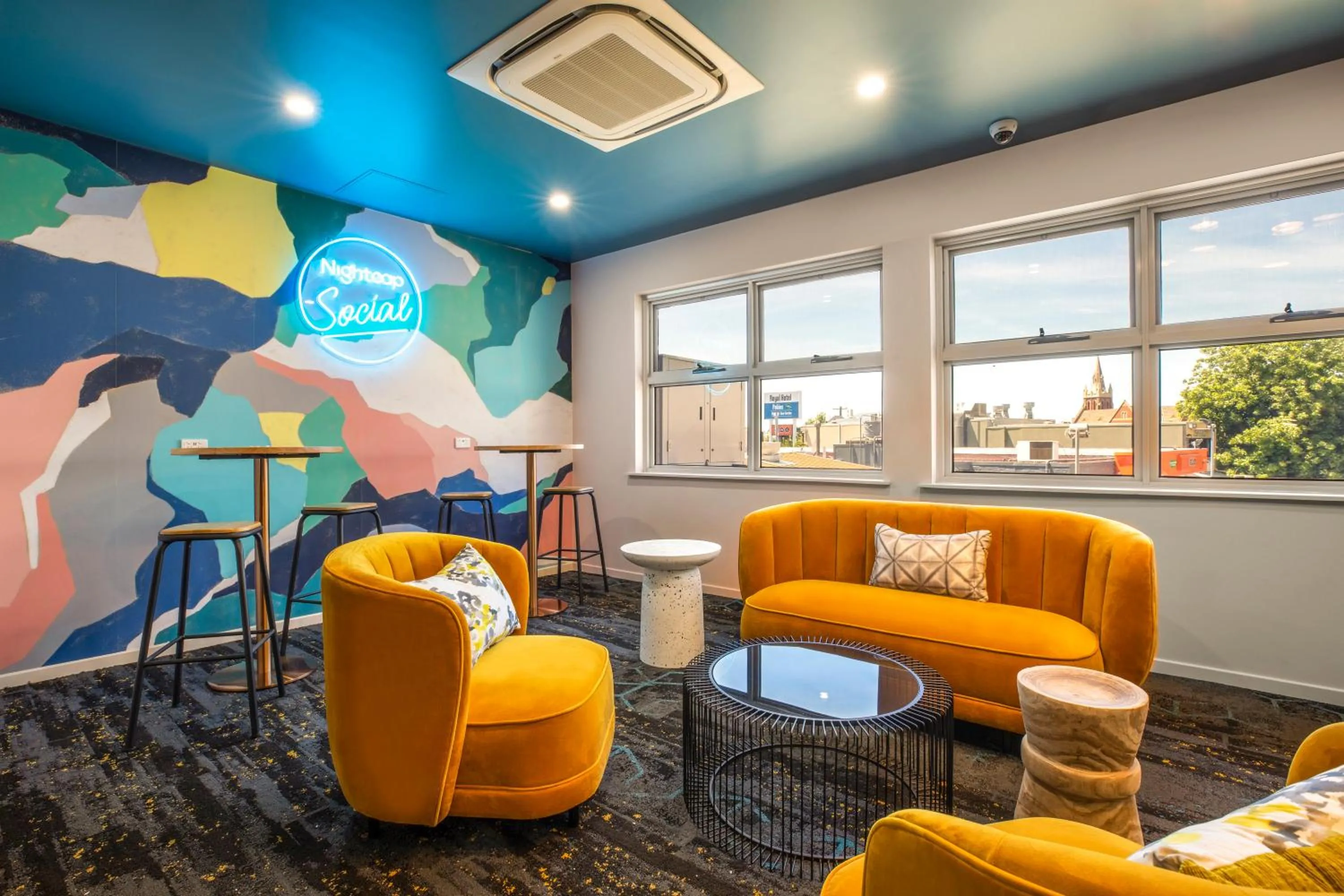 Communal lounge/ TV room in Royal Hotel by Nightcap Social