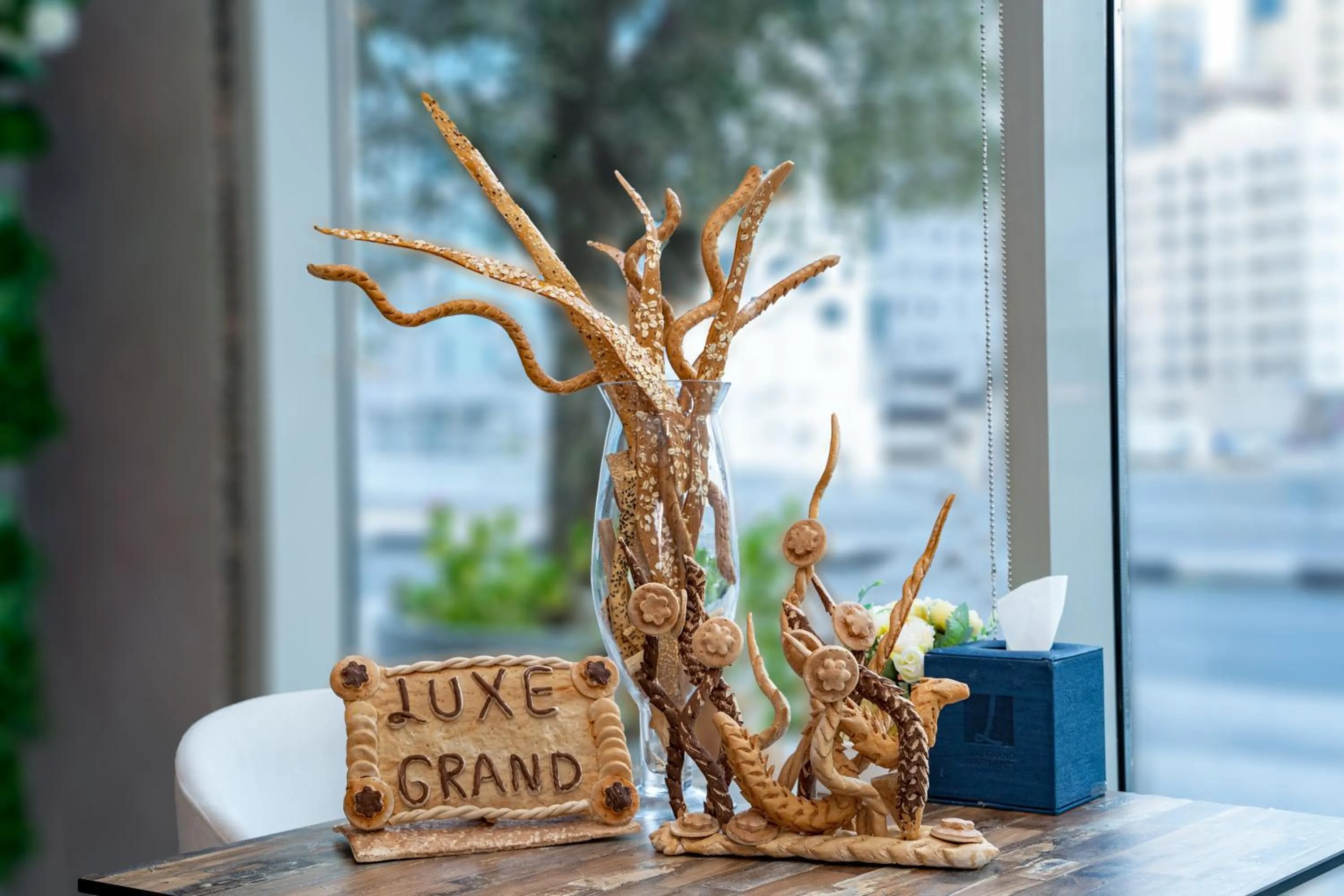 Property logo or sign in Luxe Grand Hotel Apartments