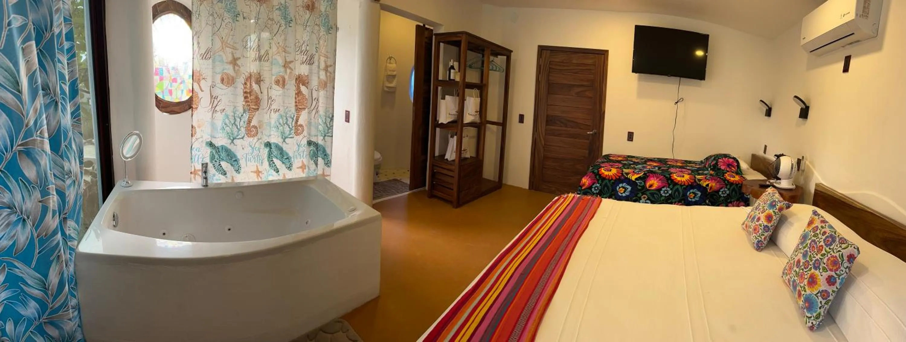 Bed in Beachfront Paradise Boutique Hotel