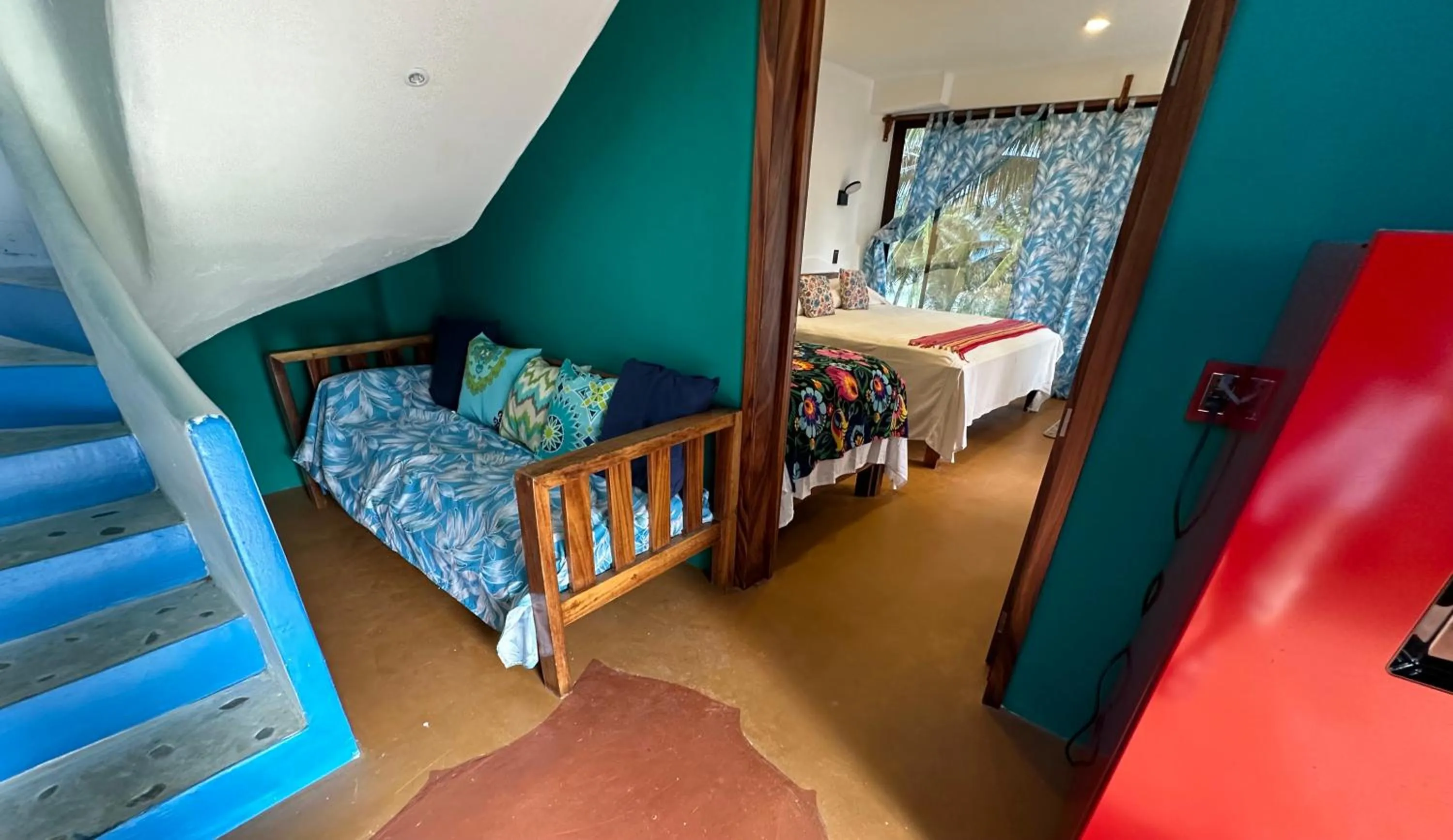 Bed in Beachfront Paradise Boutique Hotel