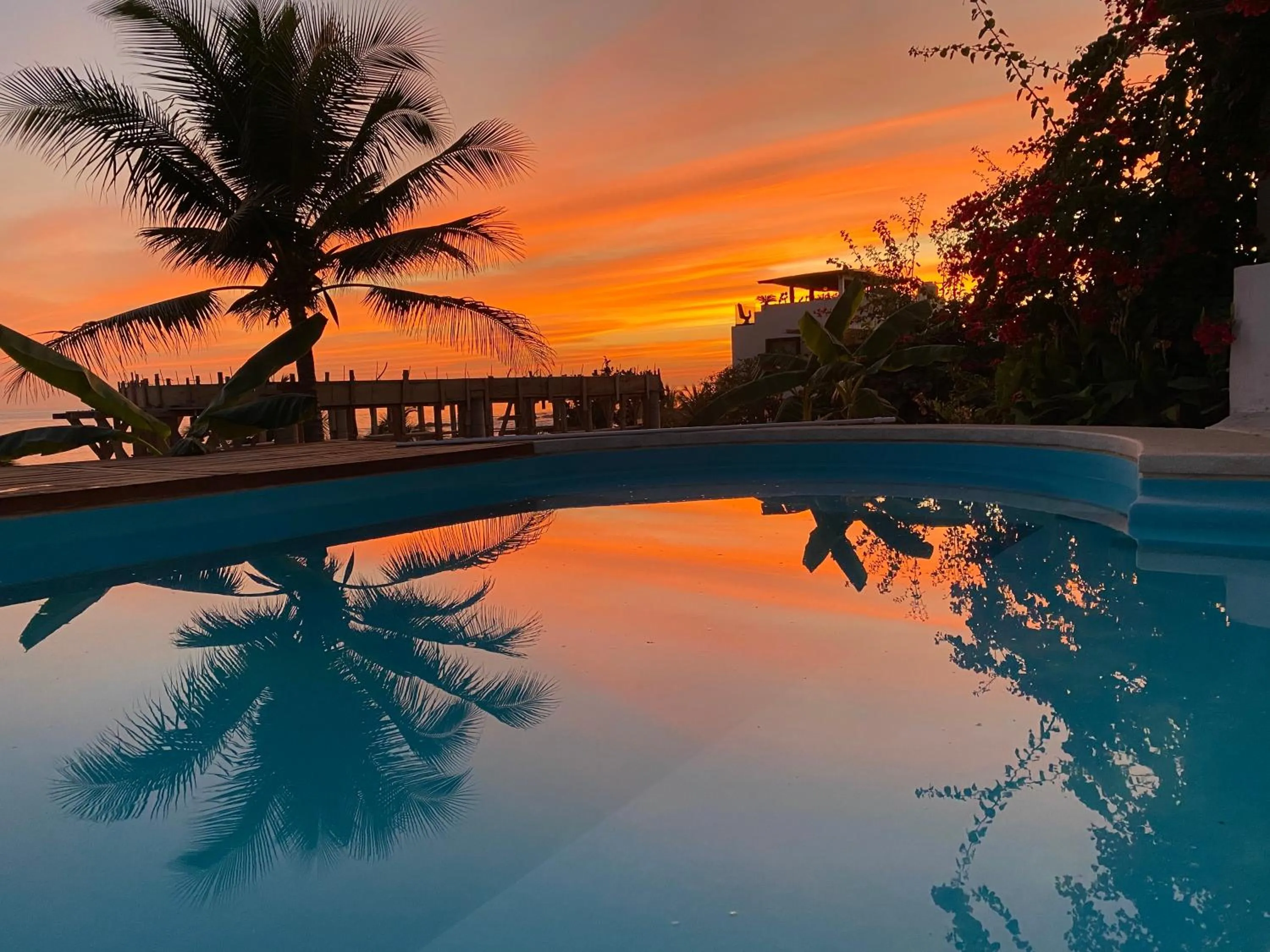 Swimming pool in Beachfront Paradise Boutique Hotel