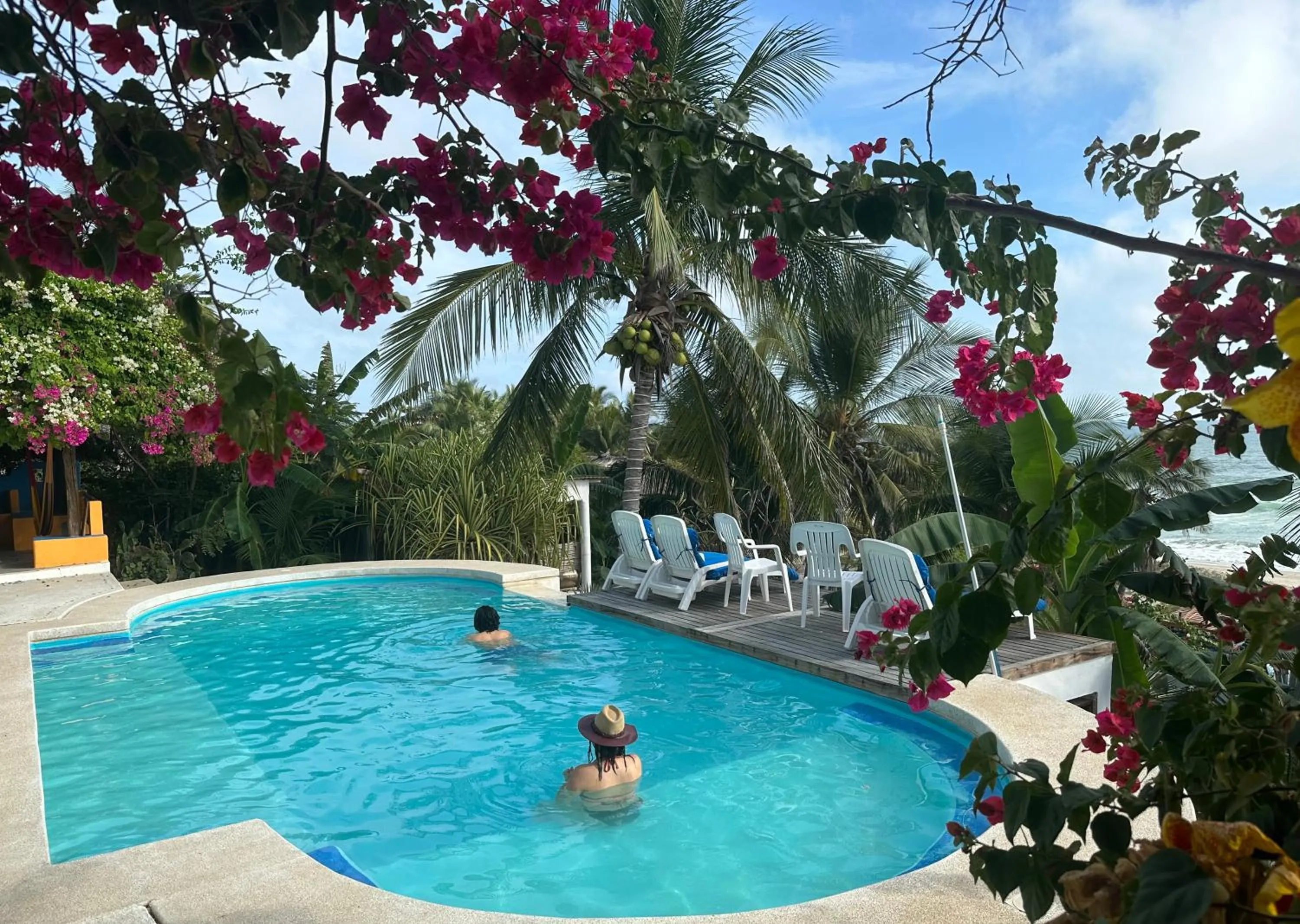 Swimming pool in Beachfront Paradise Boutique Hotel