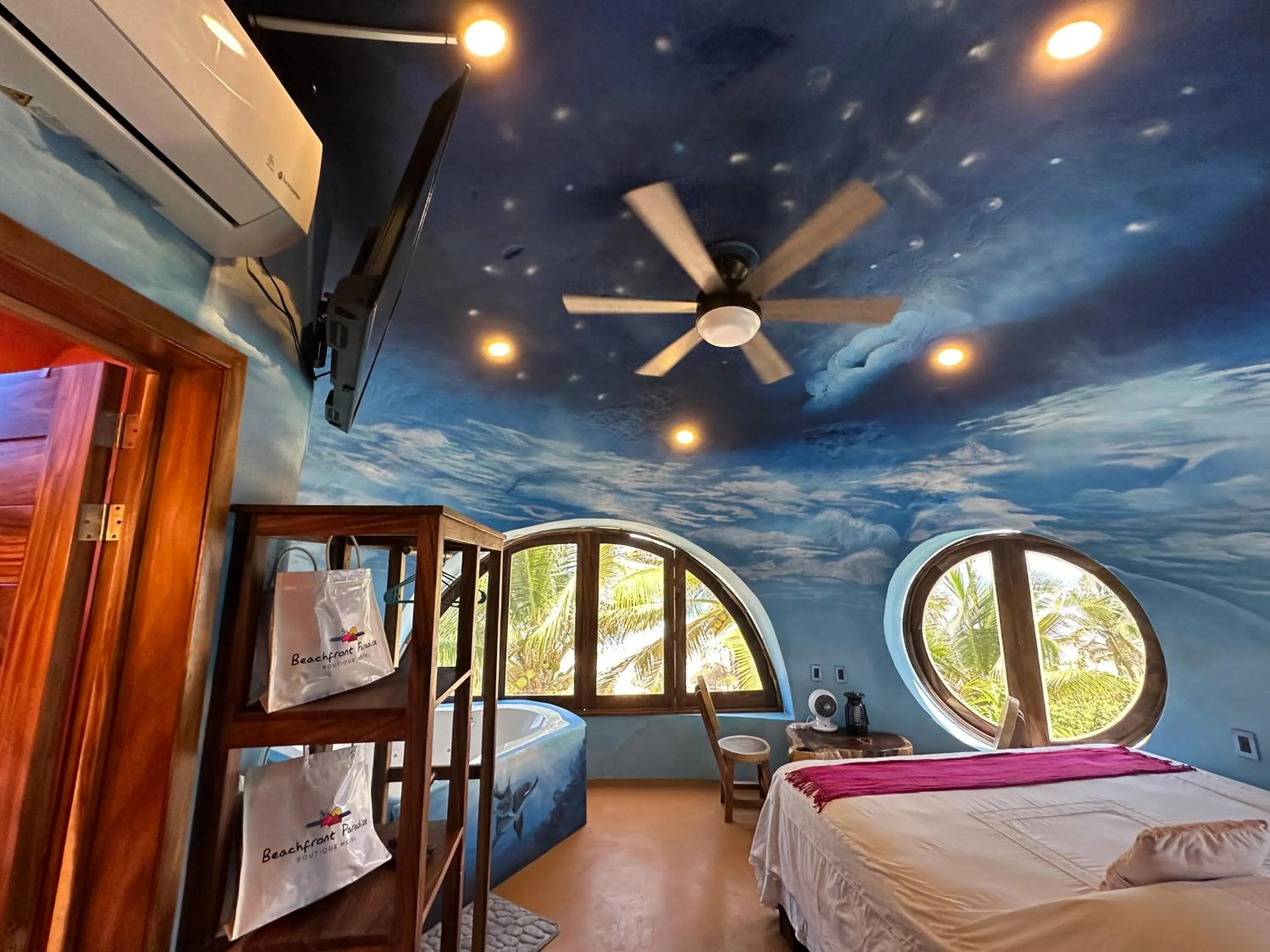 Bed in Beachfront Paradise Boutique Hotel