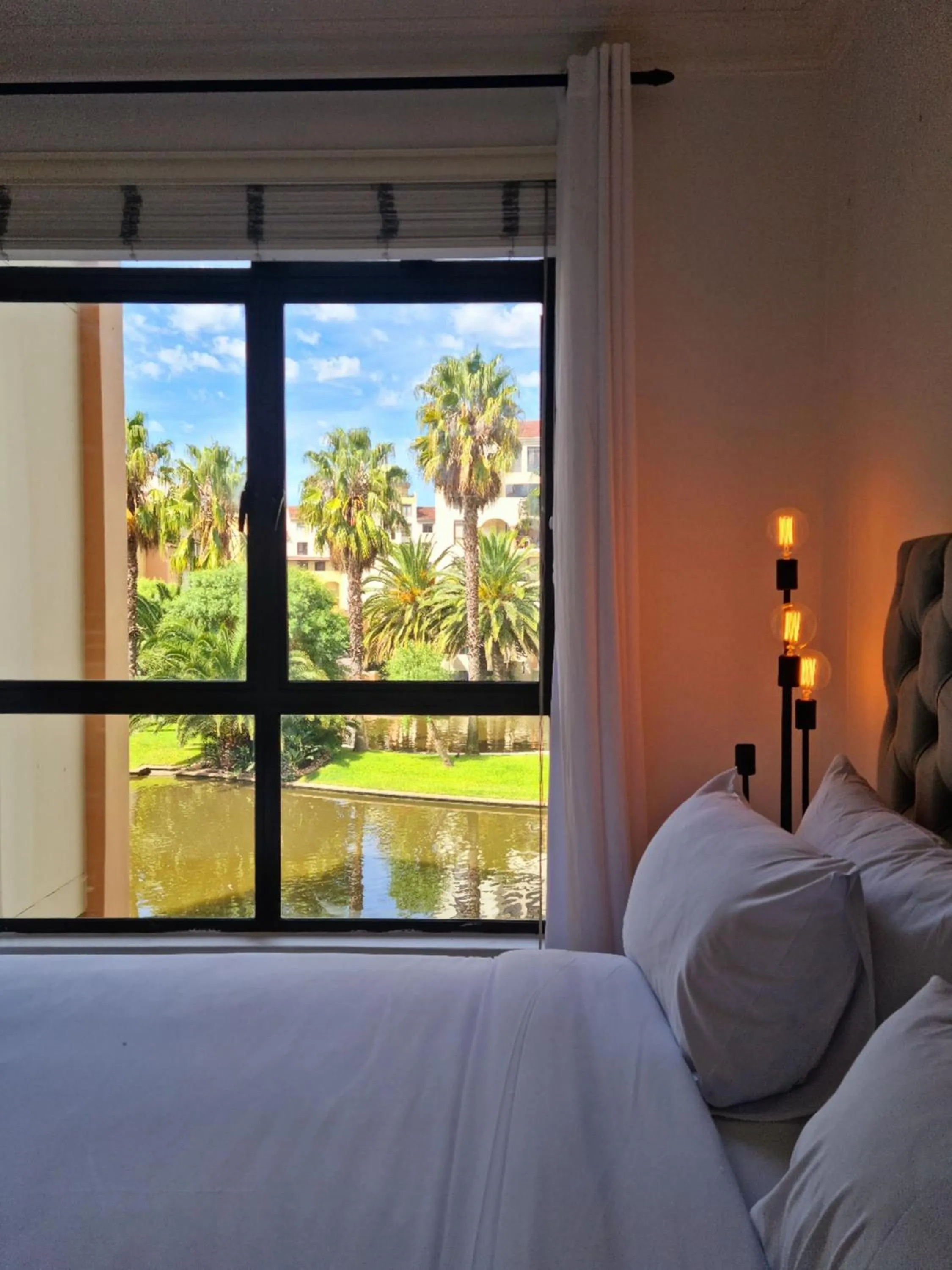 Bed in Island Club by Smart City Stays