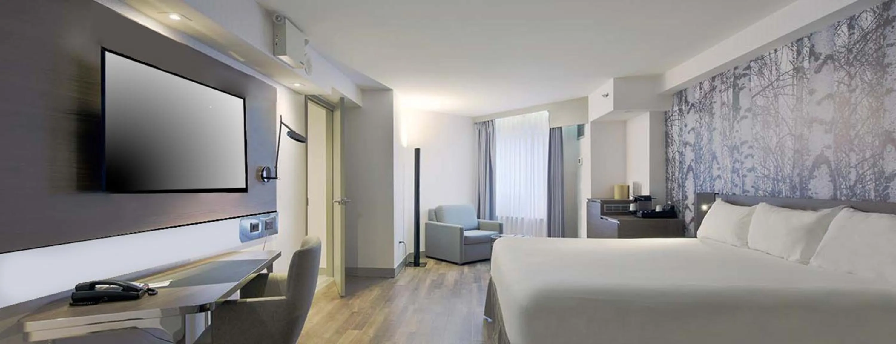 Bed in Novotel Ottawa City Centre Hotel