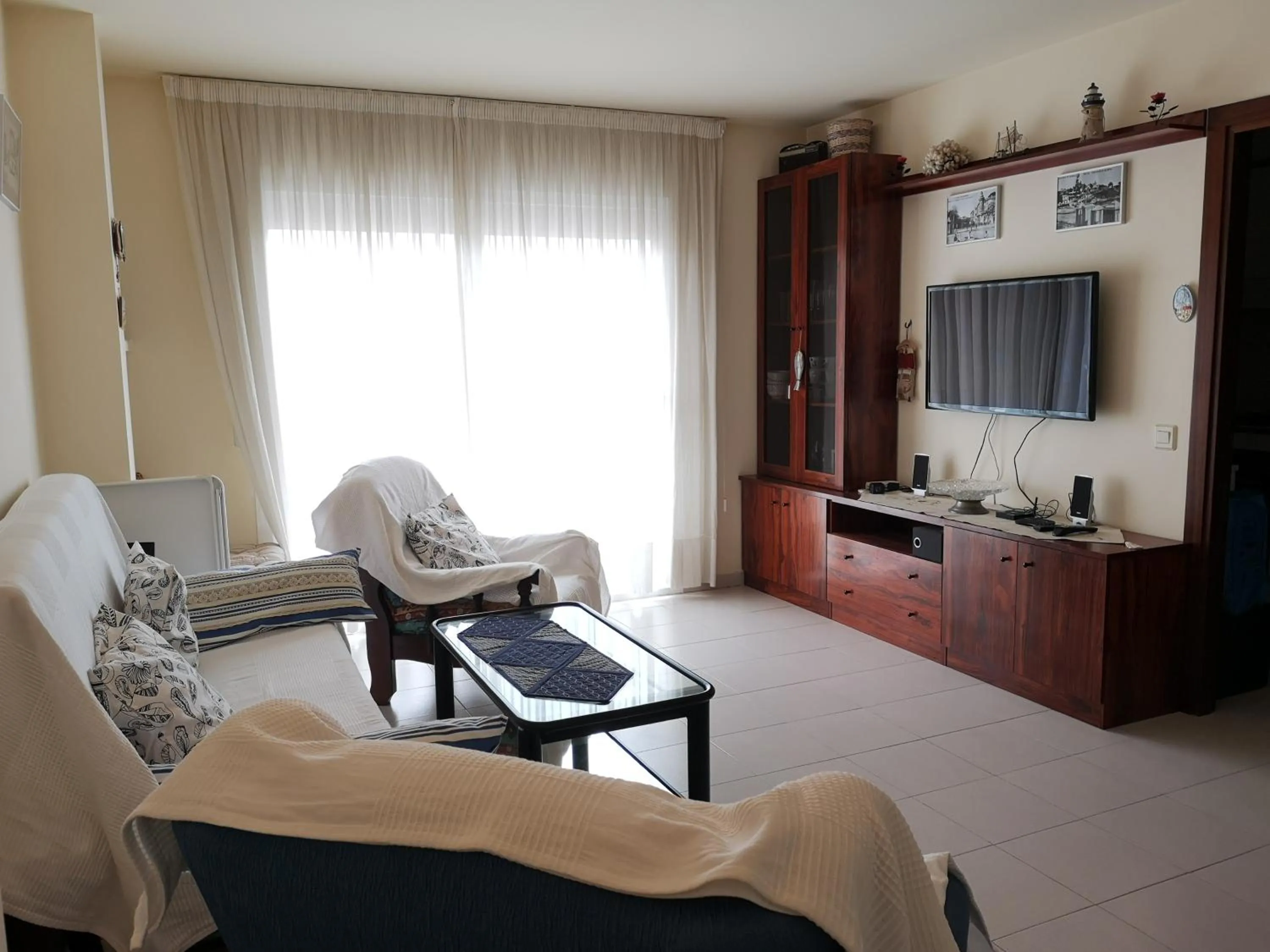 Living room in LLOGUER30 Apartamento Lotus, piscina y parquing