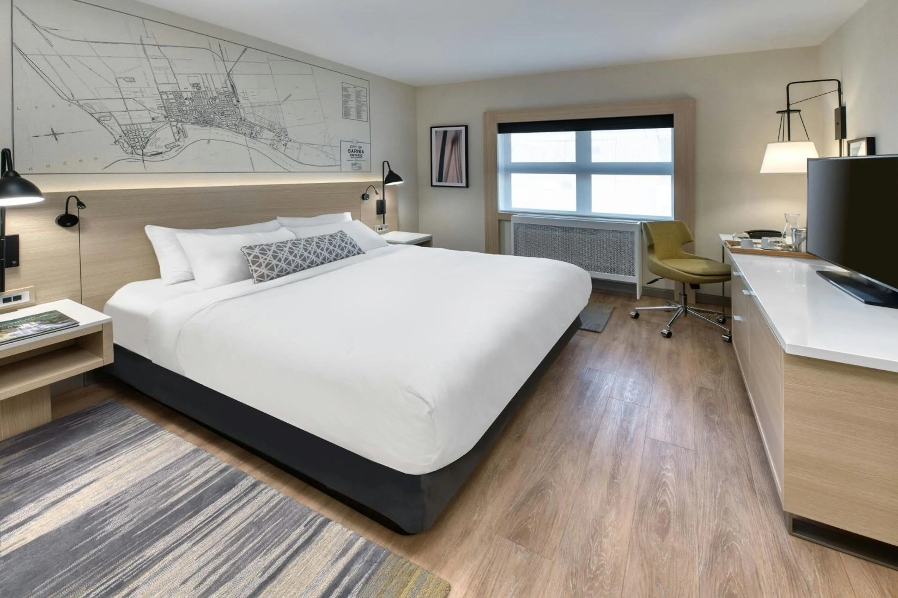 Photo of the whole room, Bed in The Insignia Hotel, Sarnia, a Tribute Portfolio Hotel