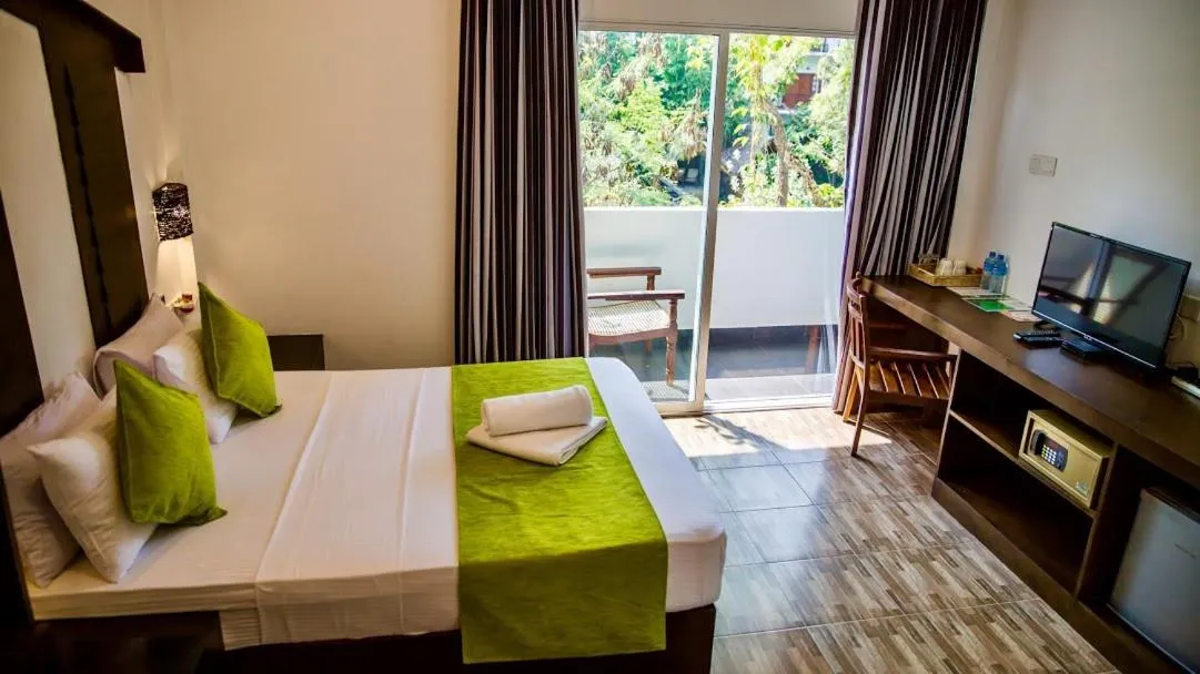 Bed in Sundaras Resort & Spa Dambulla