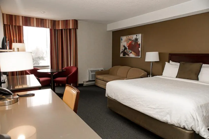 Bed in Hôtel WelcomInns