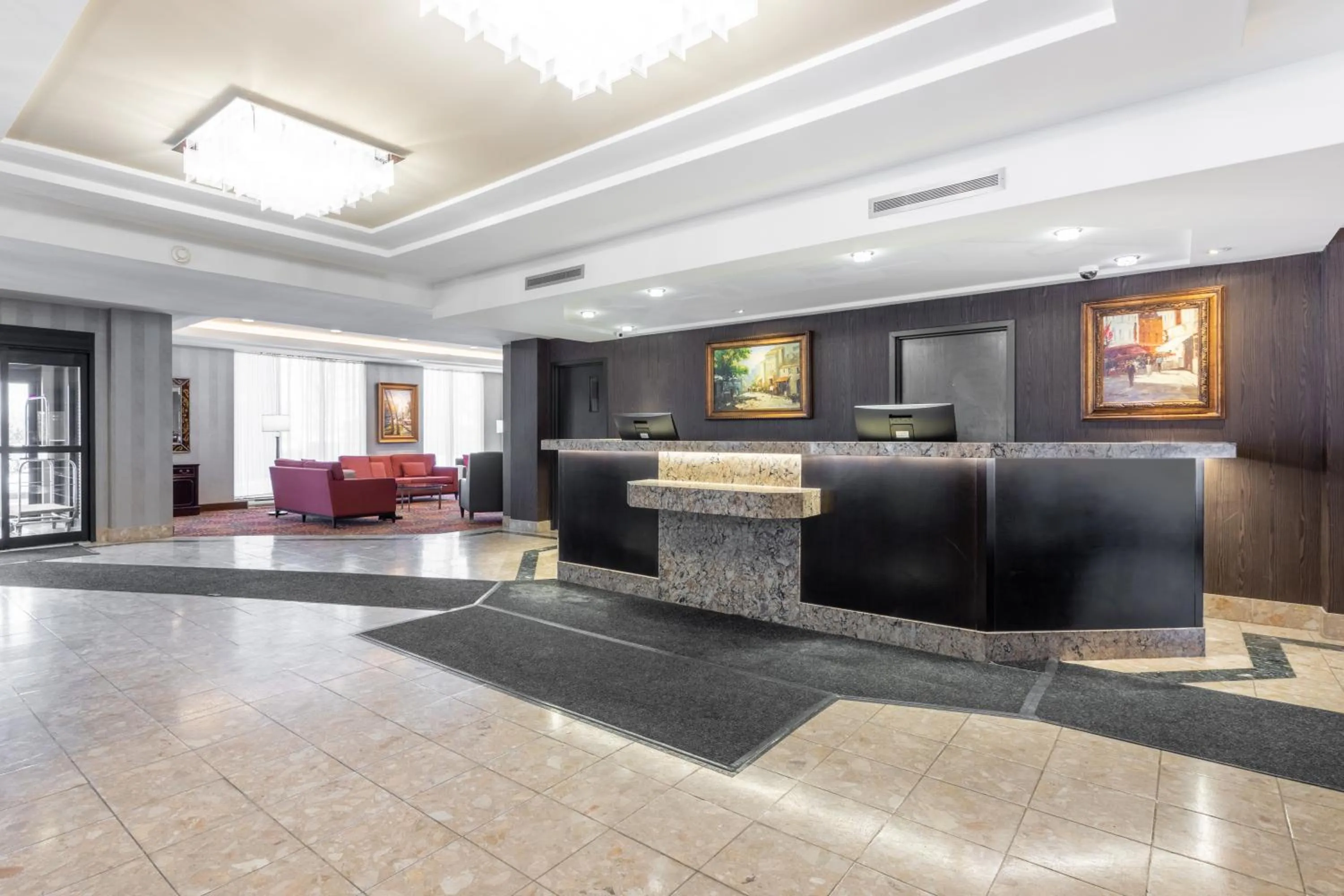 Lobby or reception in Hôtel WelcomInns