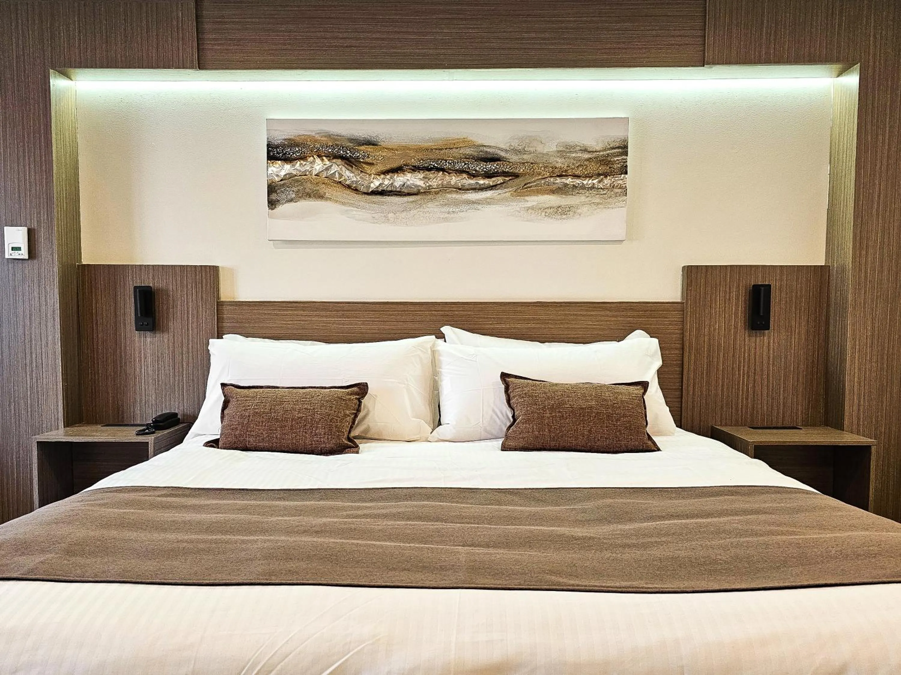 Bed in Hotel Le Voyageur