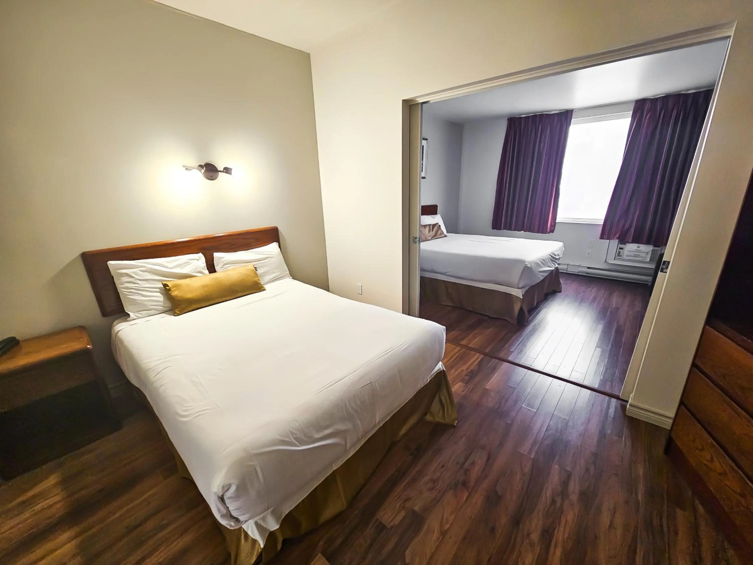 Bed in Hotel Le Voyageur