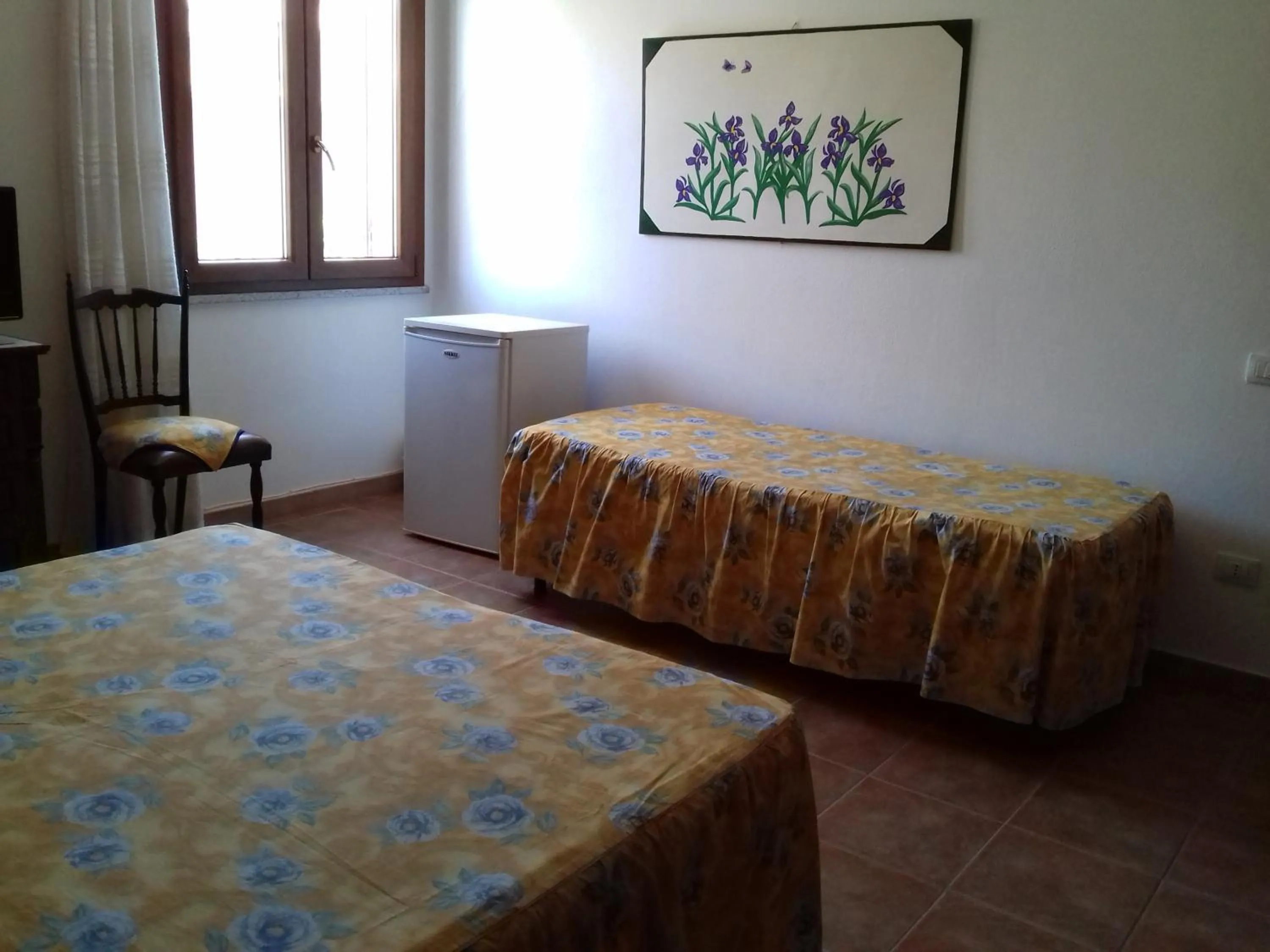 Photo of the whole room, Bed in Canne Al Vento