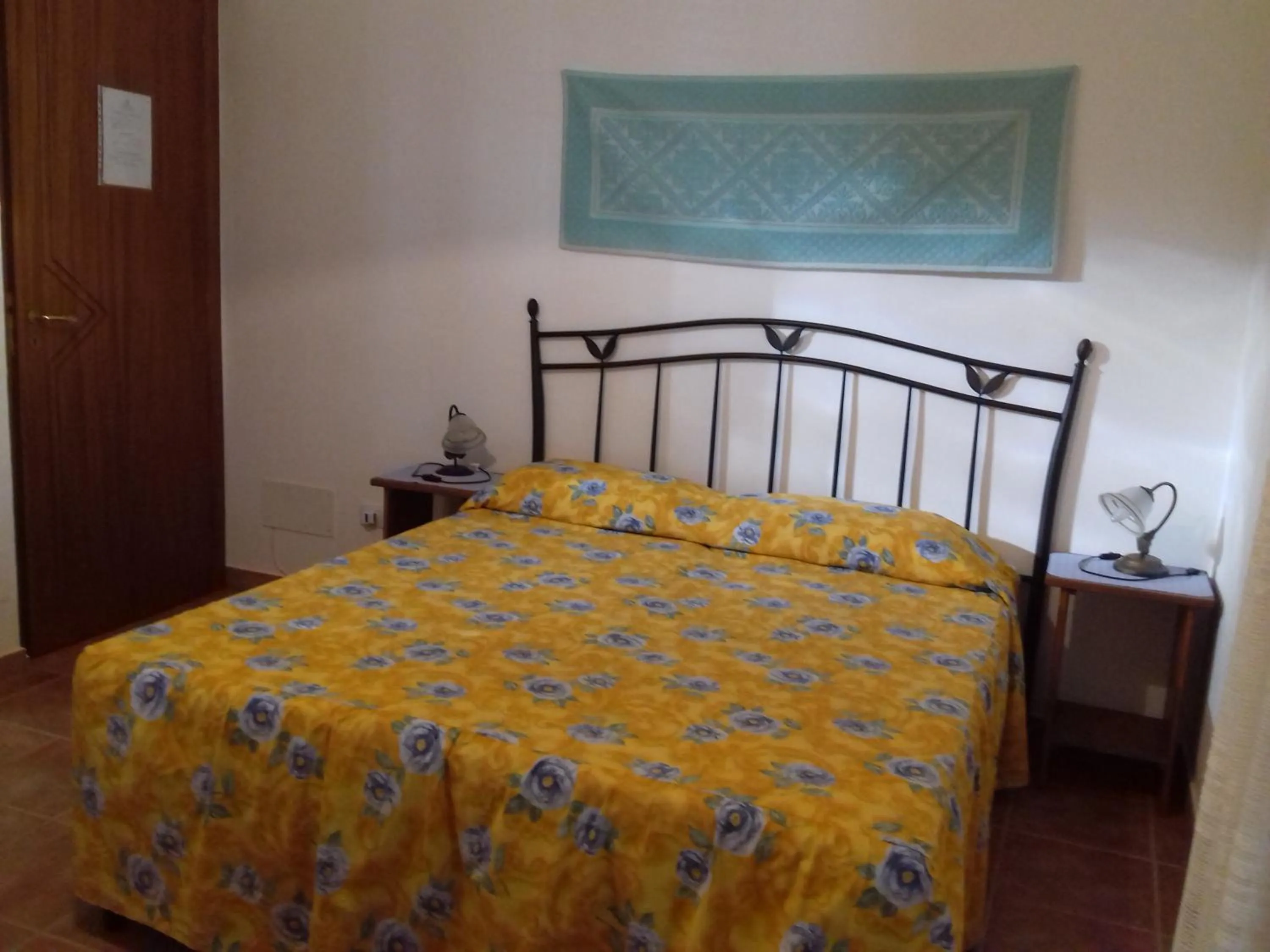 Photo of the whole room, Bed in Canne Al Vento