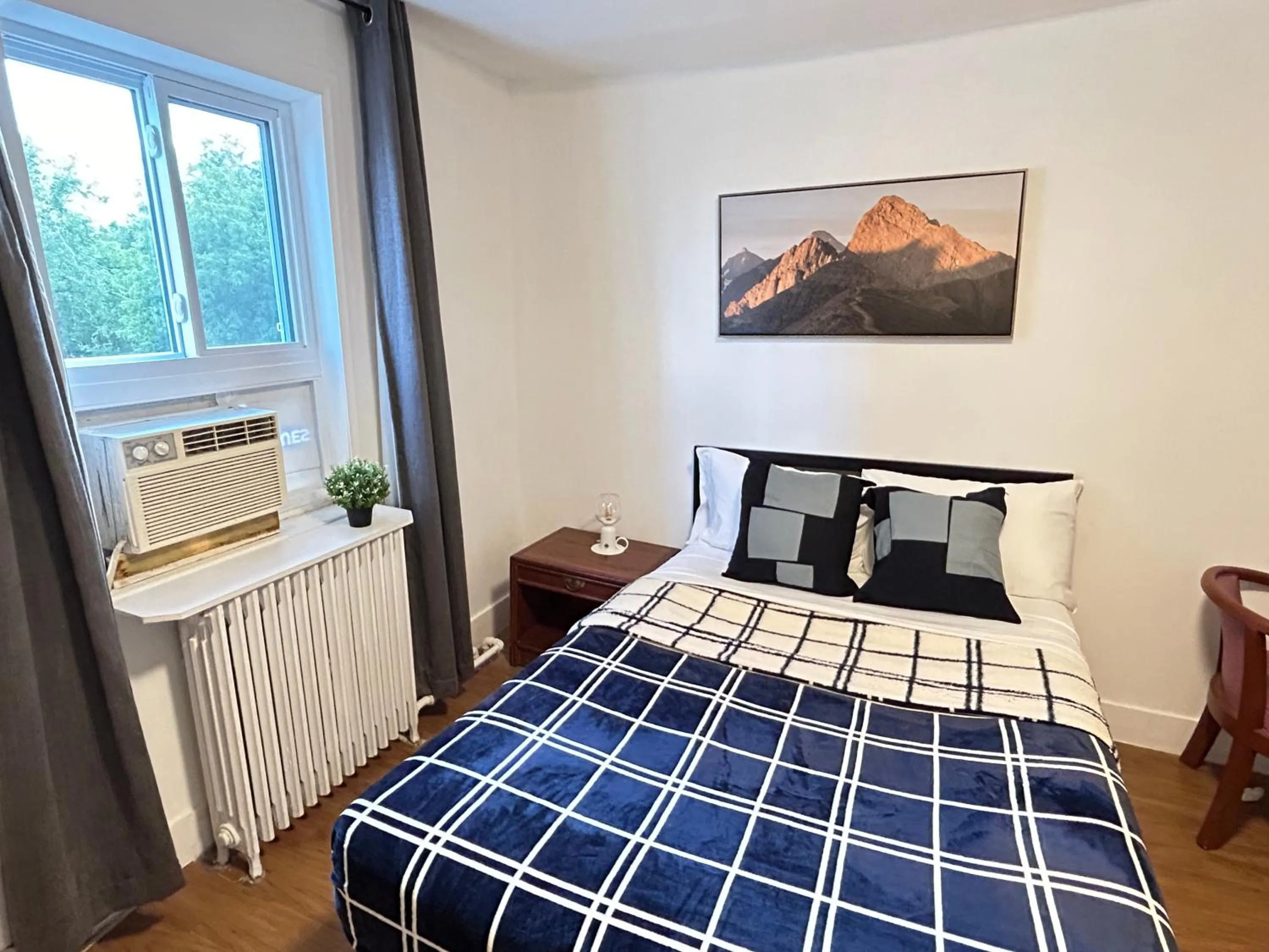 Bed in Hotel La Residence du Voyageur