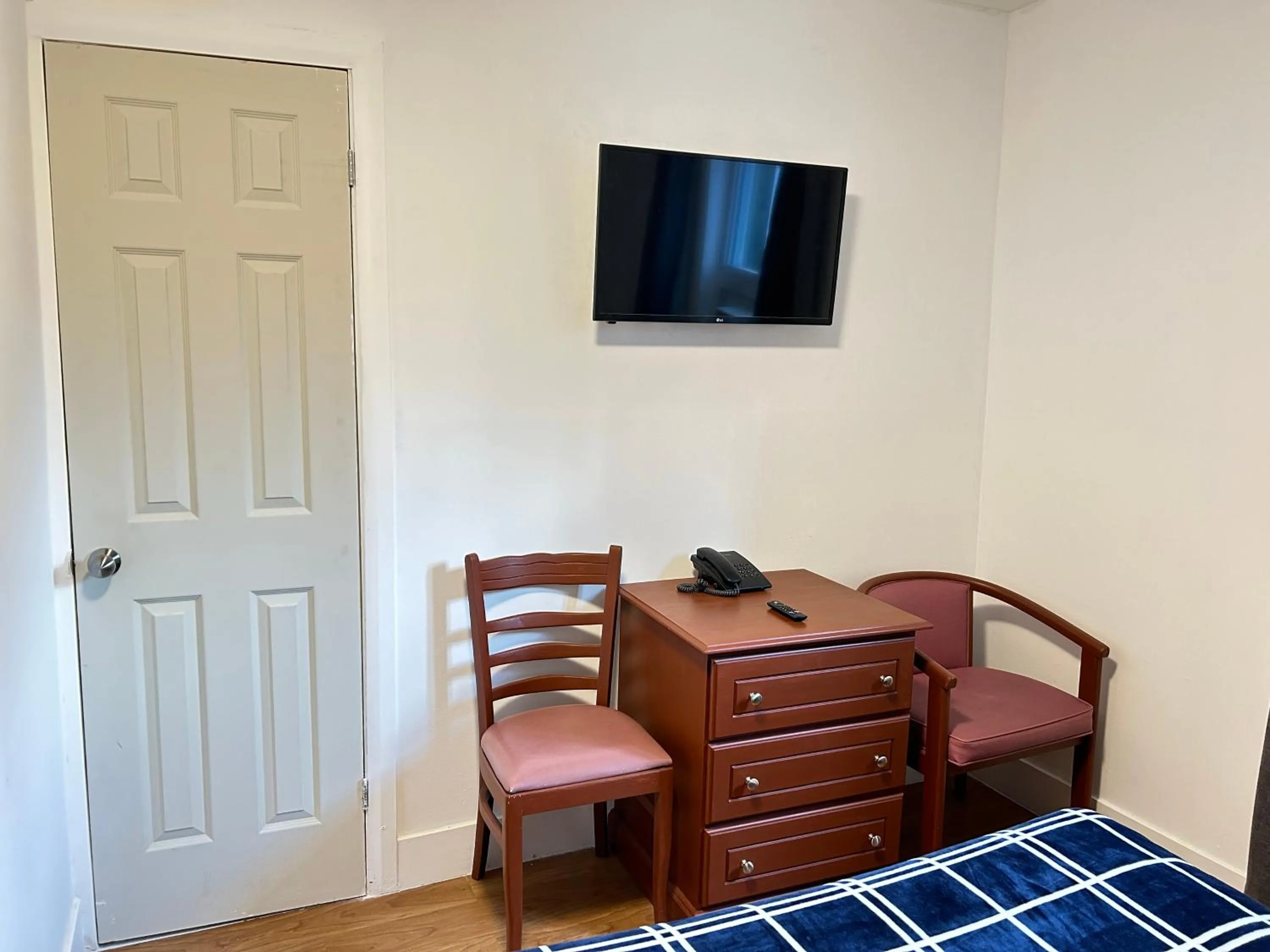 Bed in Hotel La Residence du Voyageur