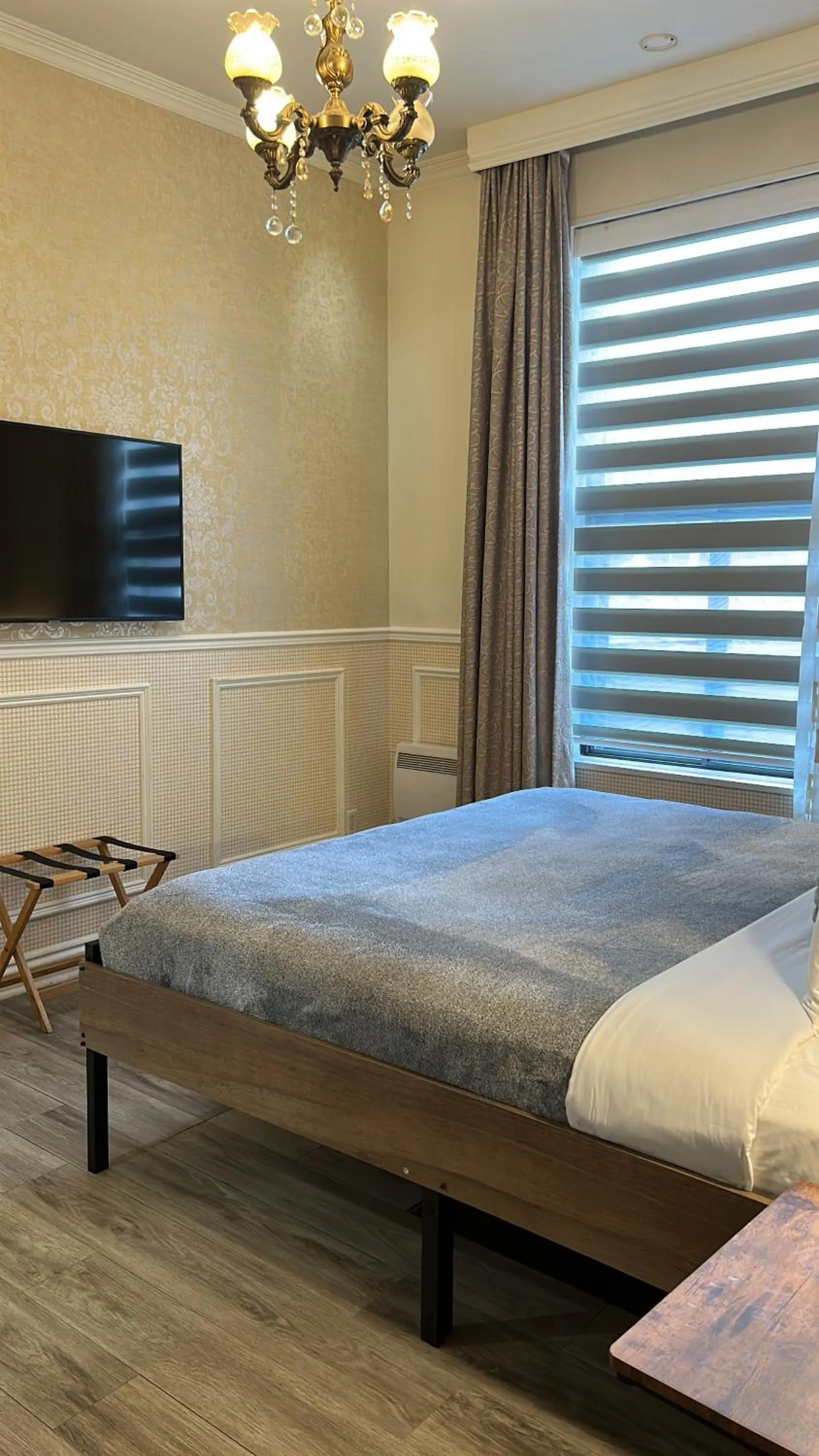 Bed in Parc Suites Hotel