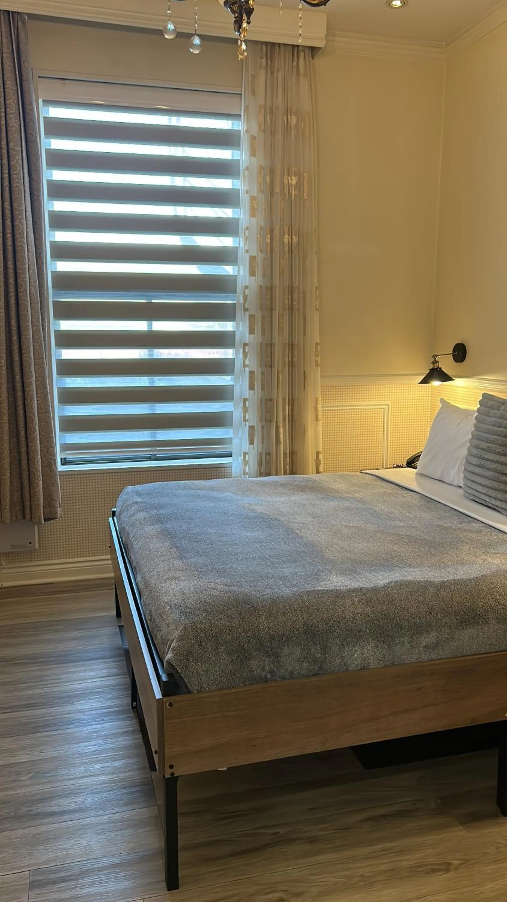 Bed in Parc Suites Hotel