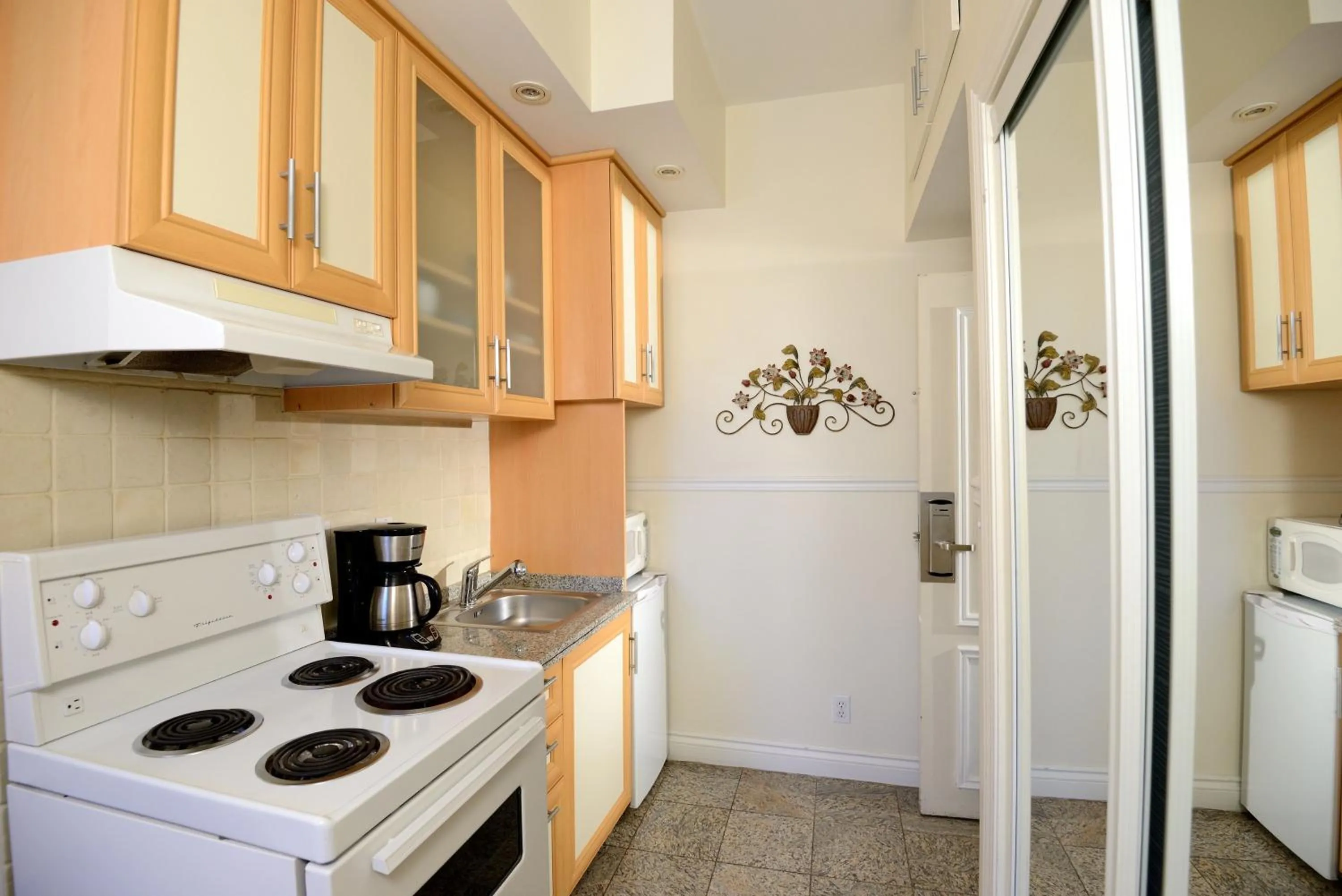 Kitchen or kitchenette in Parc Suites Hotel