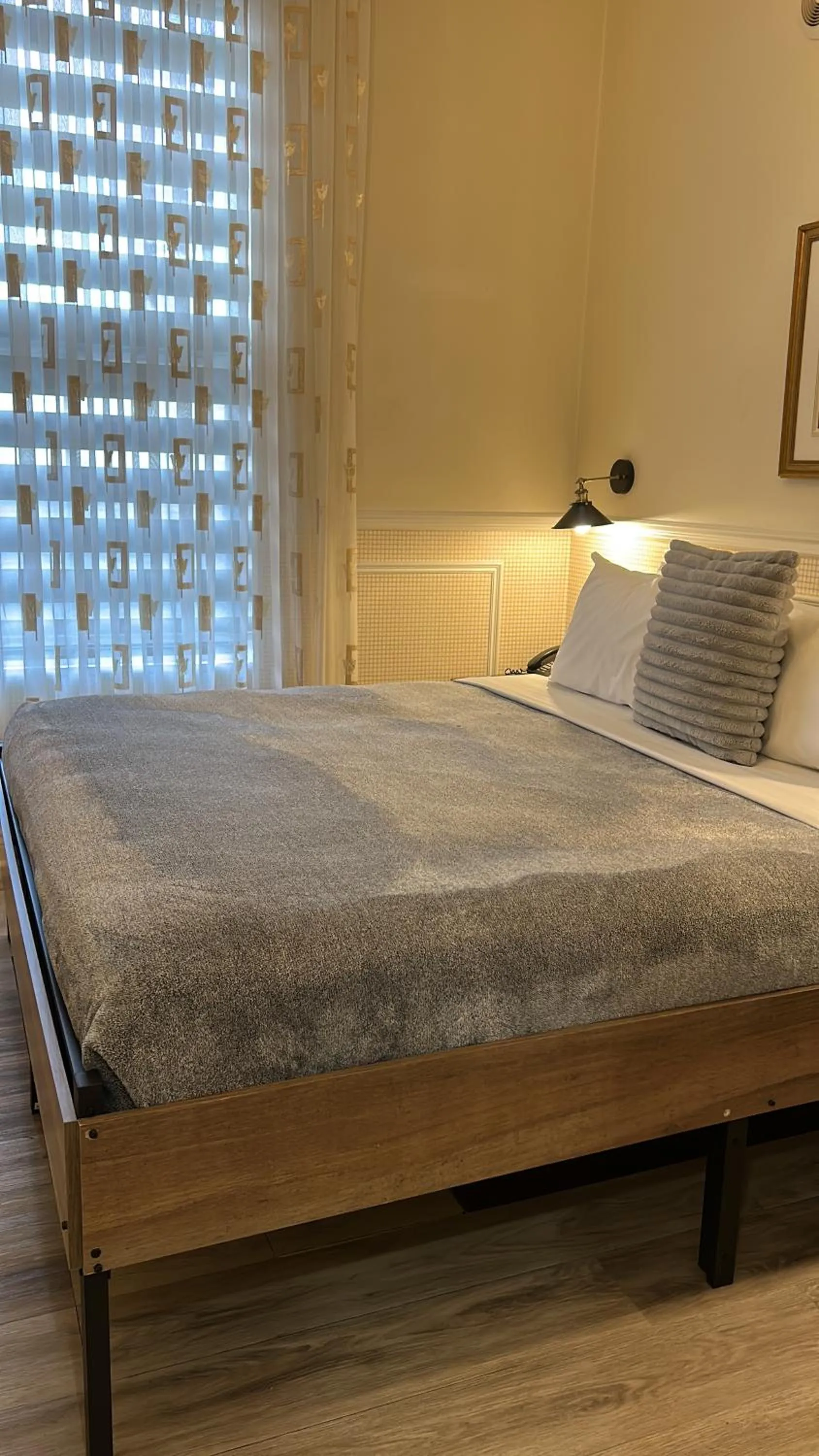 Bed in Parc Suites Hotel