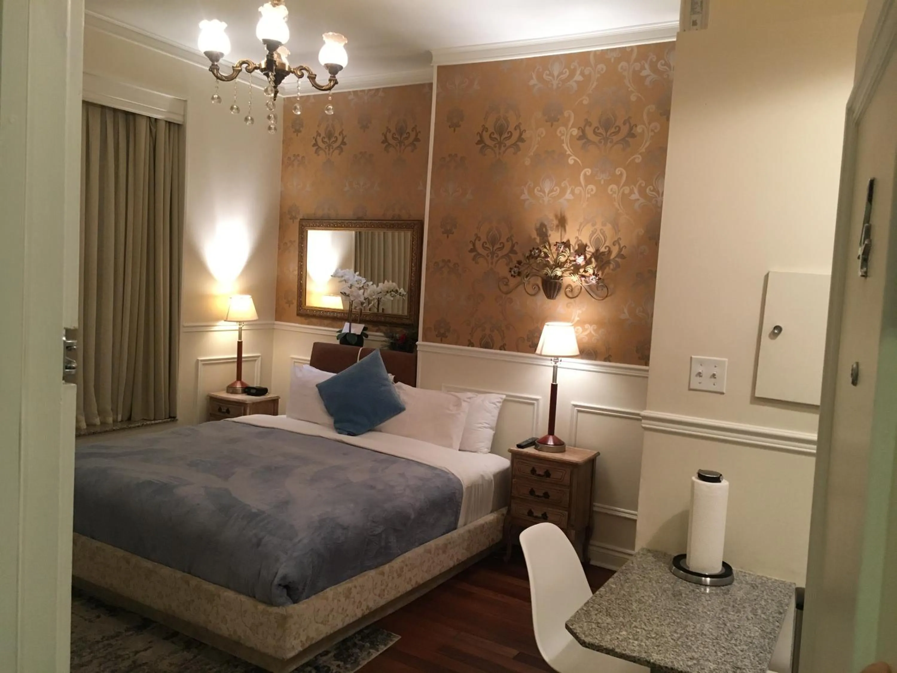 Bed in Parc Suites Hotel