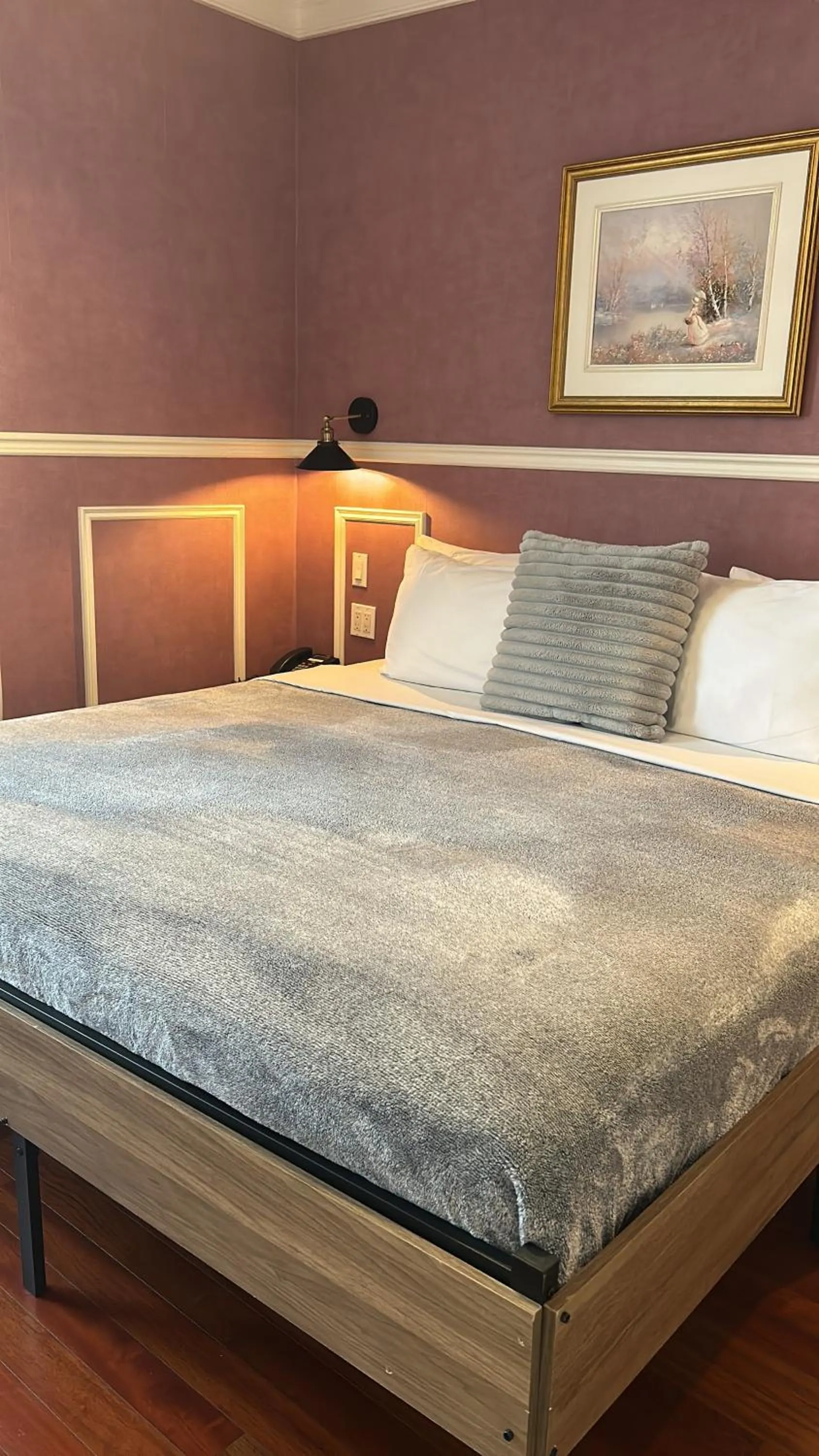 Bed in Parc Suites Hotel