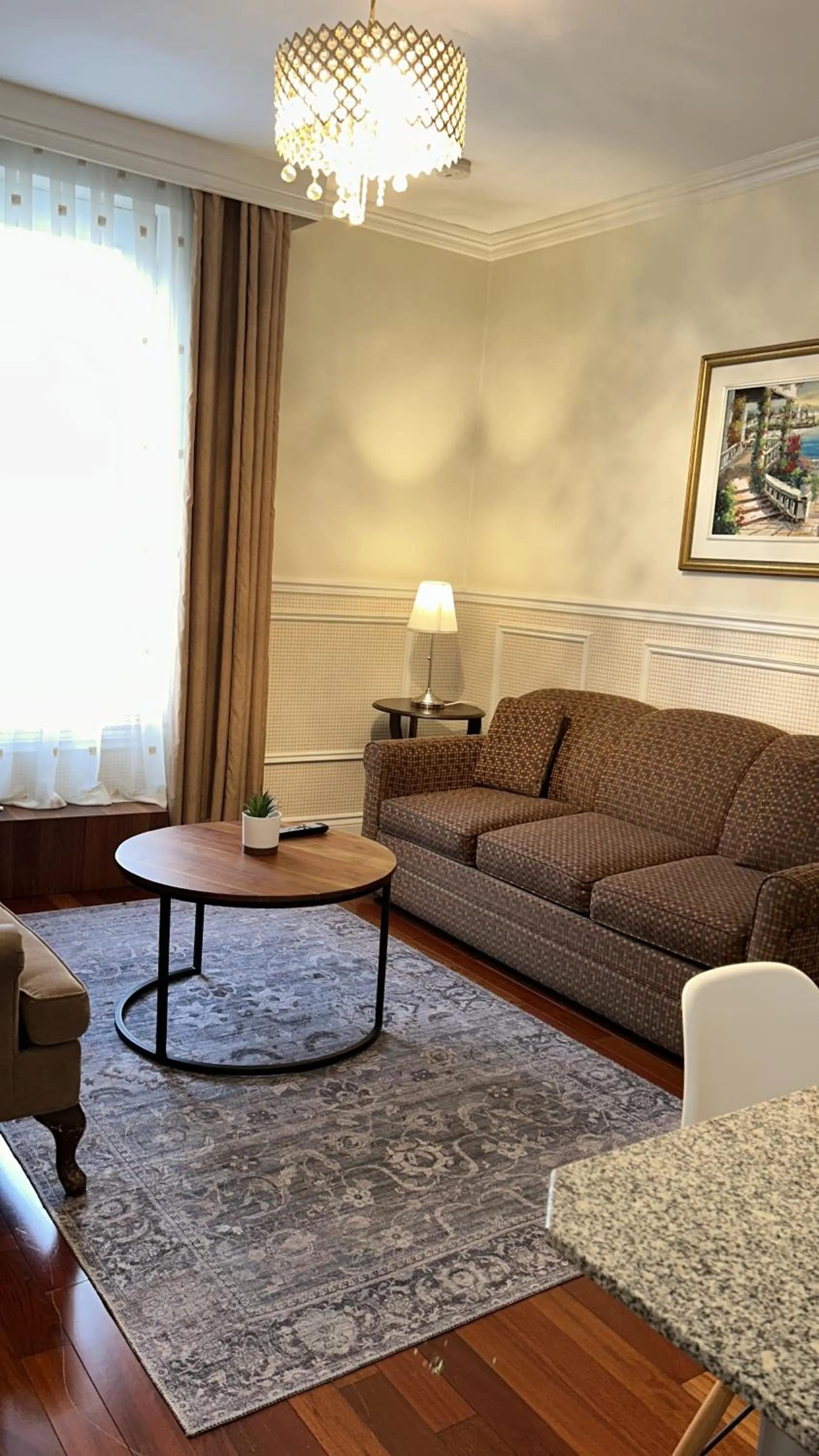 Living room in Parc Suites Hotel